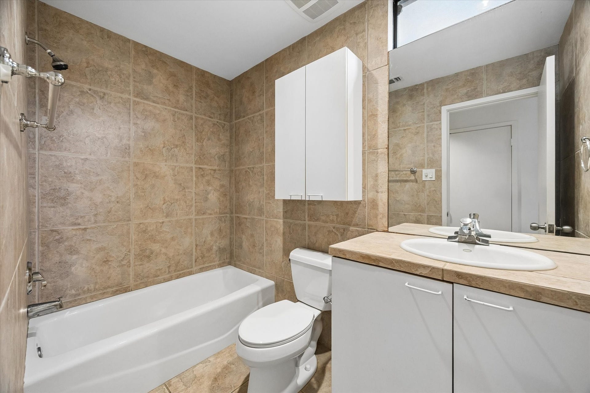 ONE OF THE 2 BATHS IN THE OFFICE AREA. COMPLETE WITH NICE SHOWER, STORAGE, AND ELECTRICAL OUTLETS FOR PERSONAL USE.