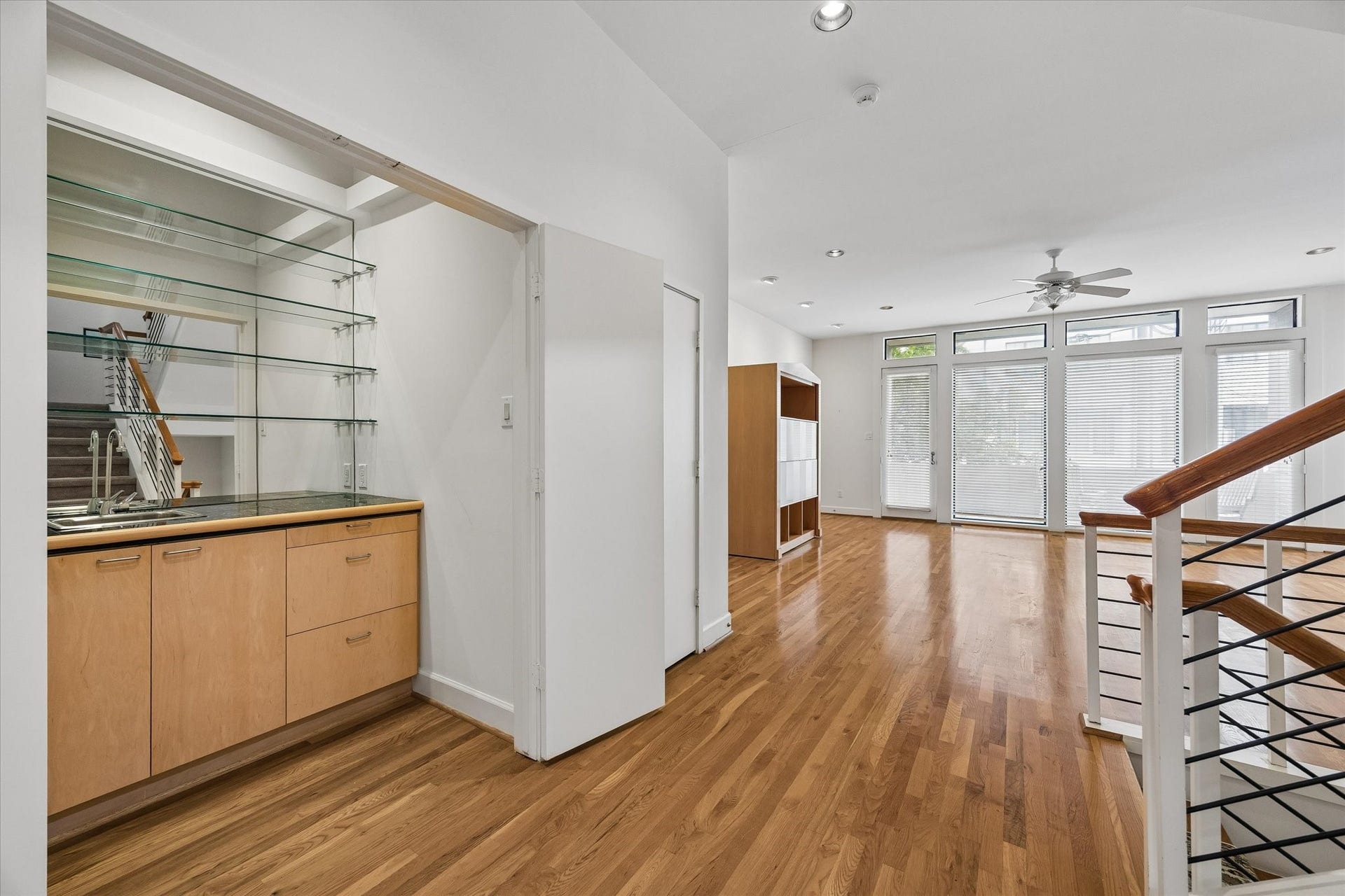 A BEAUTIFUL WET BAR ACROSS FROM KITCHEN AREA, FOR YOUR GUEST TO ENJOY.  THIS HOME HAS IT ALL.