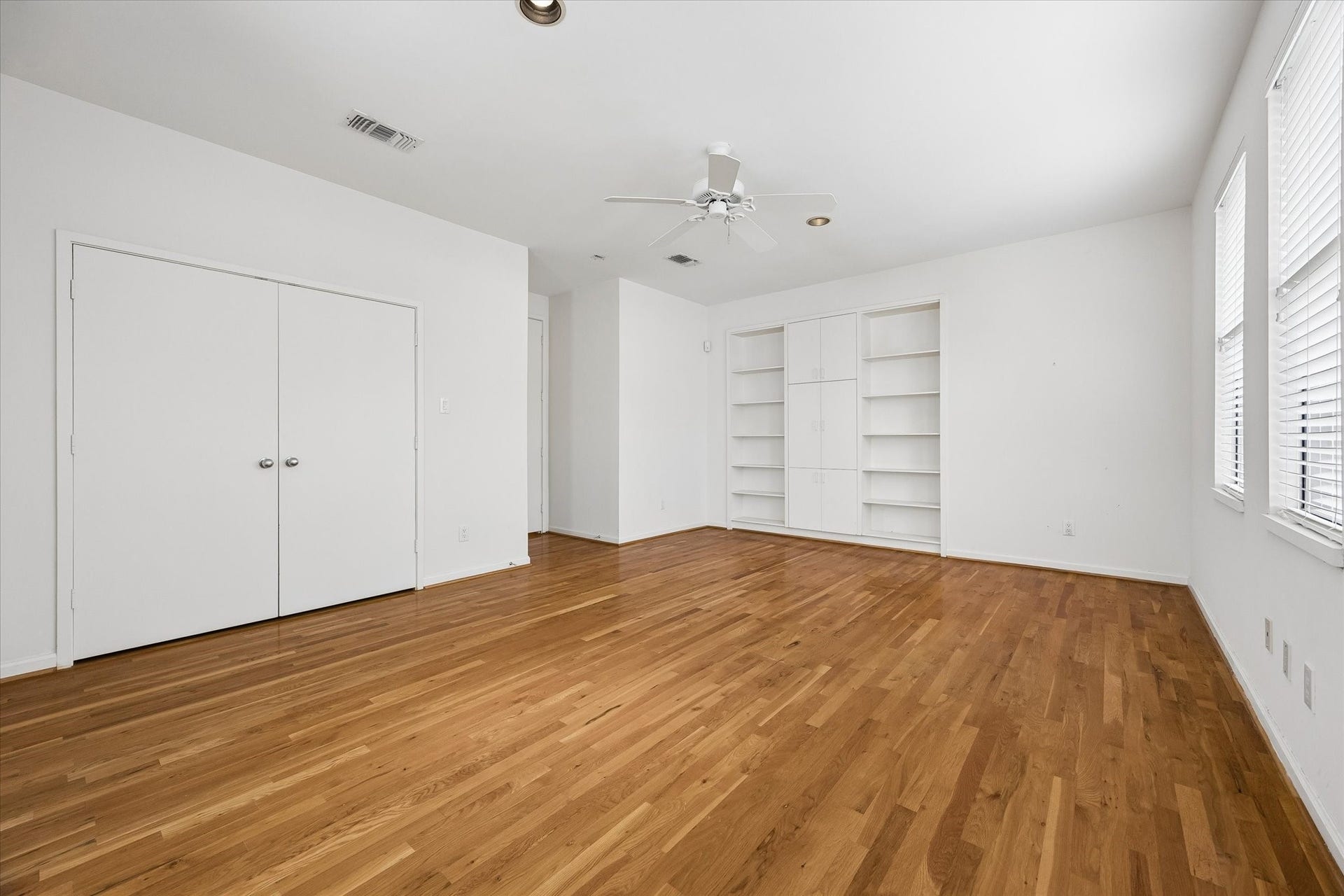 ANOTHER VIEW OF THE NICE SIZED GUEST ROOM WITH HUGE A CLOSET AND COZY AREA FOR READING.  THIS ALSO HAS ITS OWN BATH CLOSE-BY.