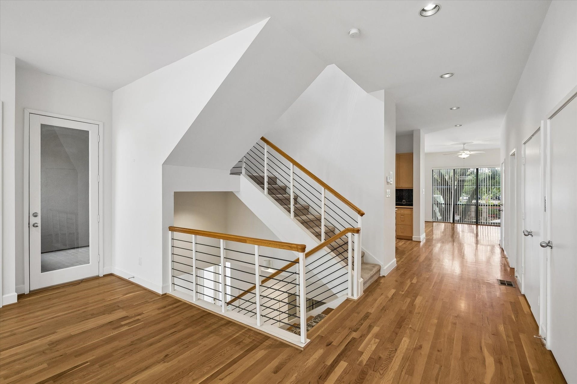 ANOTHER AREA OF THE OPEN LIVING ROOM, TO ALL AREAS OF THE HOME.