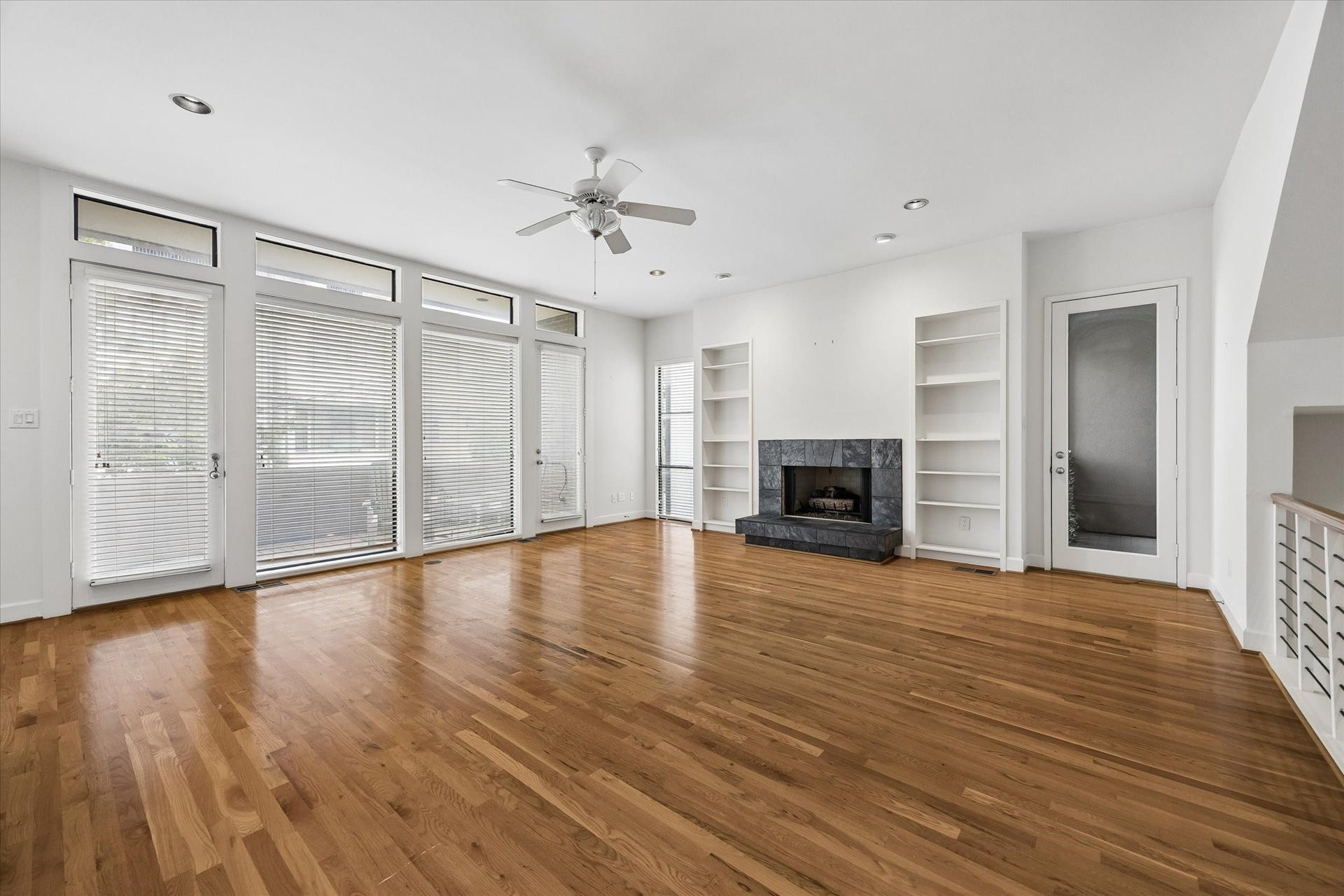 BEAUTIFUL GAS LOGS MAKES FOR A COZY STAY.  ENJOY ALL THE NATURAL LIGHT.  LOVE ALL THE HUGE WINDOWS AND DOORS.  ALSO THIS LEADS TO 2 OUTSIDE BALCONIES TO ENJOY THE EVENING BREEZE.