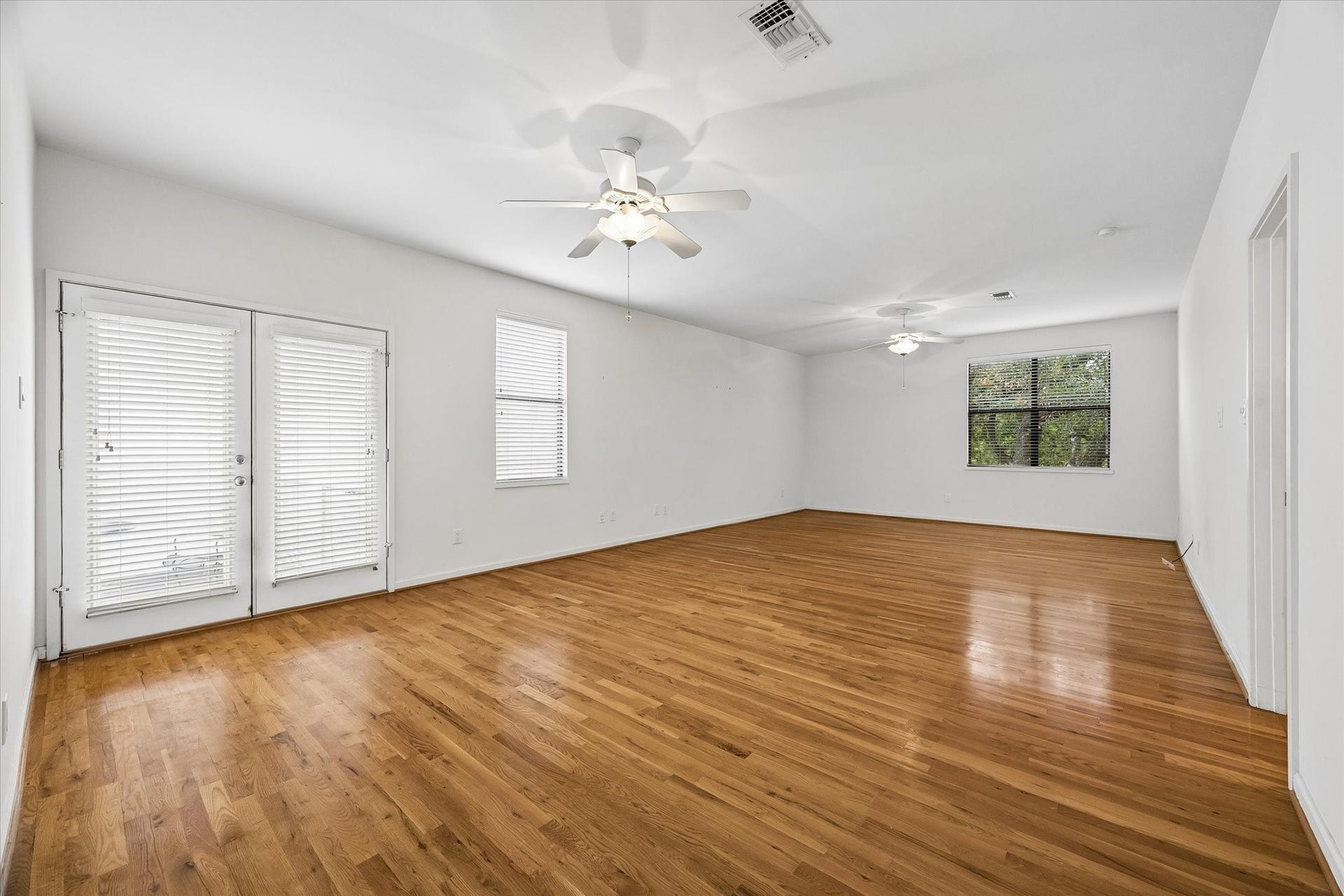 THIS CAN BE YOUR SANCTUARY AND RETREAT FROM A LONG DAYS WORK.  THIS PRIMARY HAS THE SPACE FOR  AN OFFICE AND LIVING AREA.  THIS ROOM ALSO HAS A BALCONY FOR THE EVENING BREEZE.
