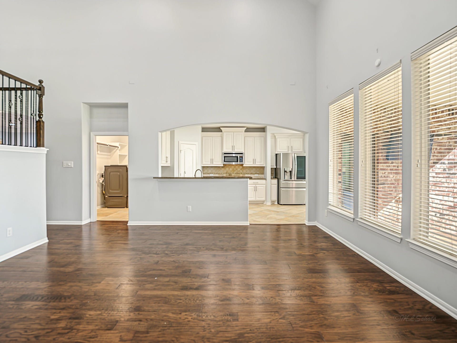 Turn around and view your kitchen with a breakfast bar! The utility room is conveniently located, at the end of the kitchen.