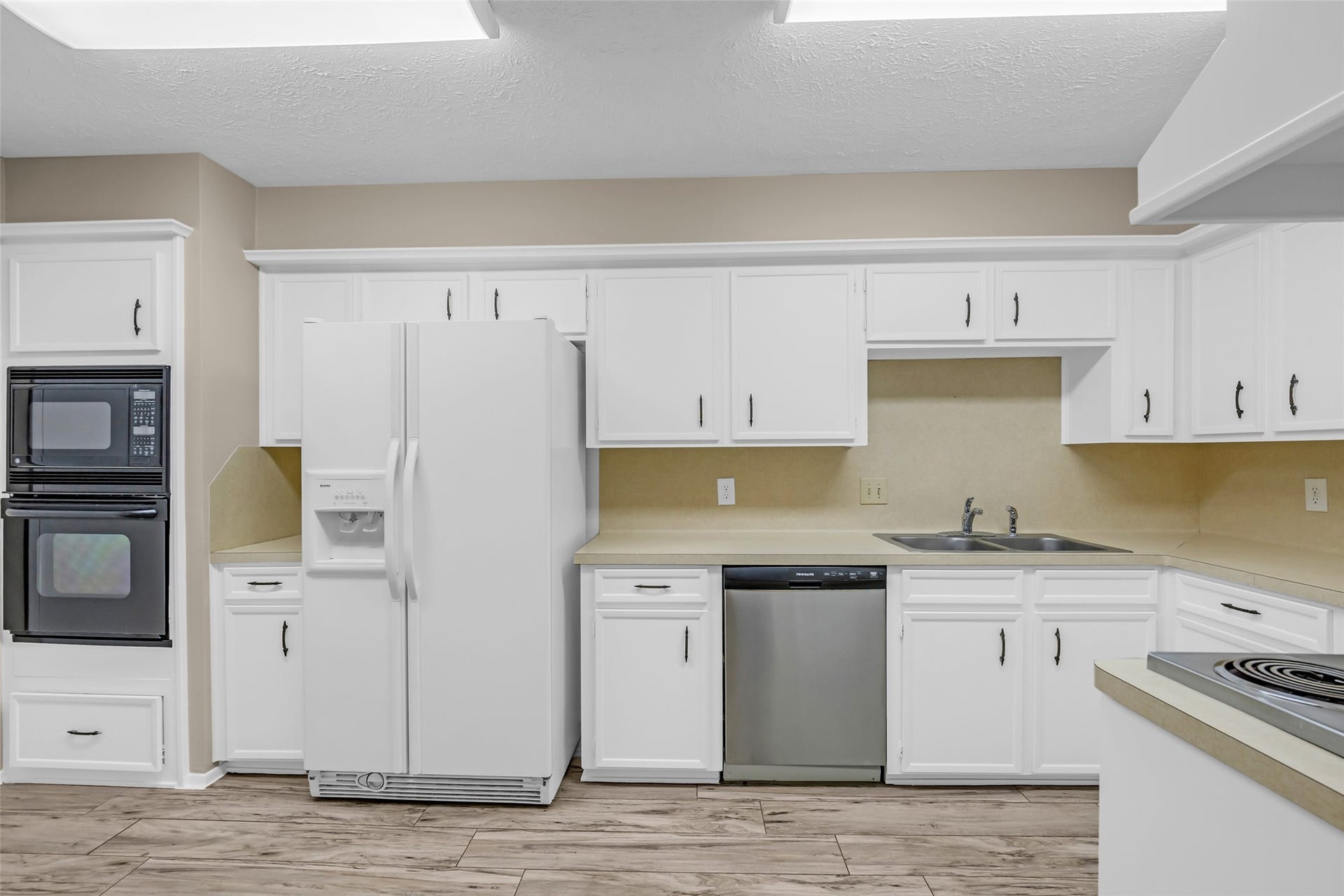 11827 Brook Meadows Lane, Meadows Place, TX 77477 Newly painted kitchen with Refrigerator included