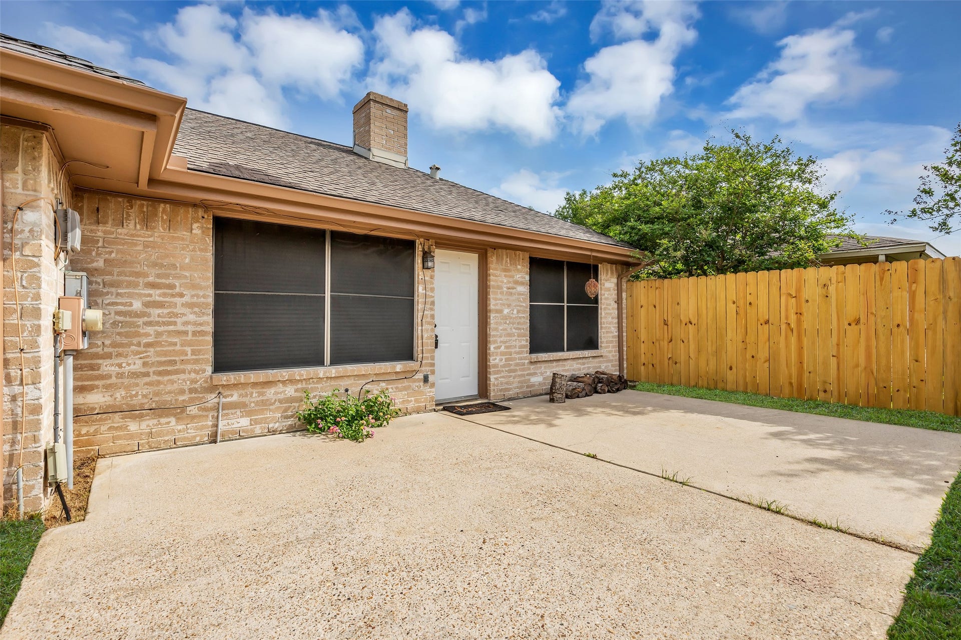 11827 Brook Meadows Lane, Meadows Place, TX 77477 Cozy back yard patio ripe with possibilities. New Fence 2026