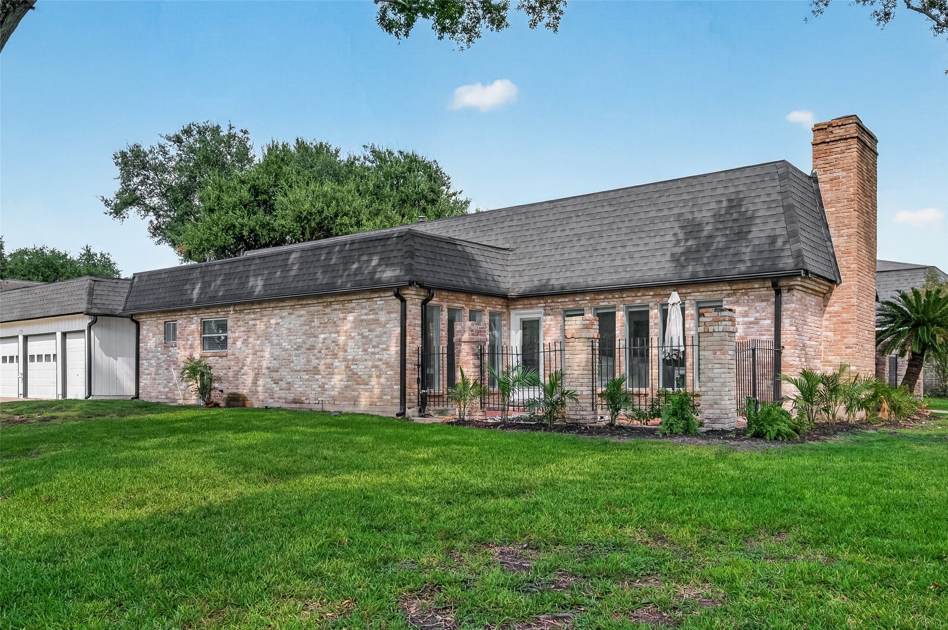 2230 S Fountain Valley Drive, Missouri City, TX 77459 Custom-designed home, with outdoor space. Featuring private green space.