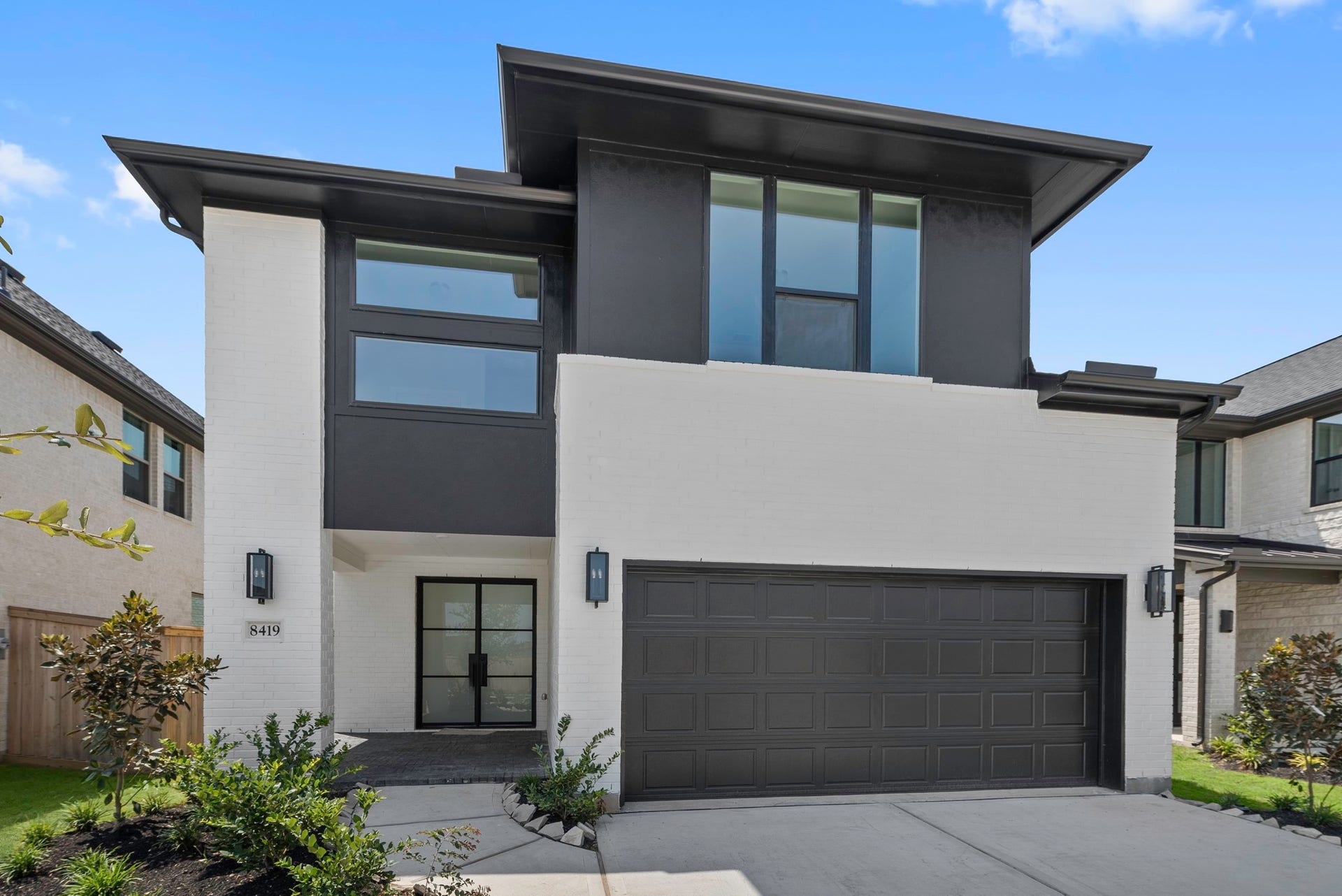 Move in Ready. Westin Homes *New Construction* Manor plan. Grass is digitally enhanced.