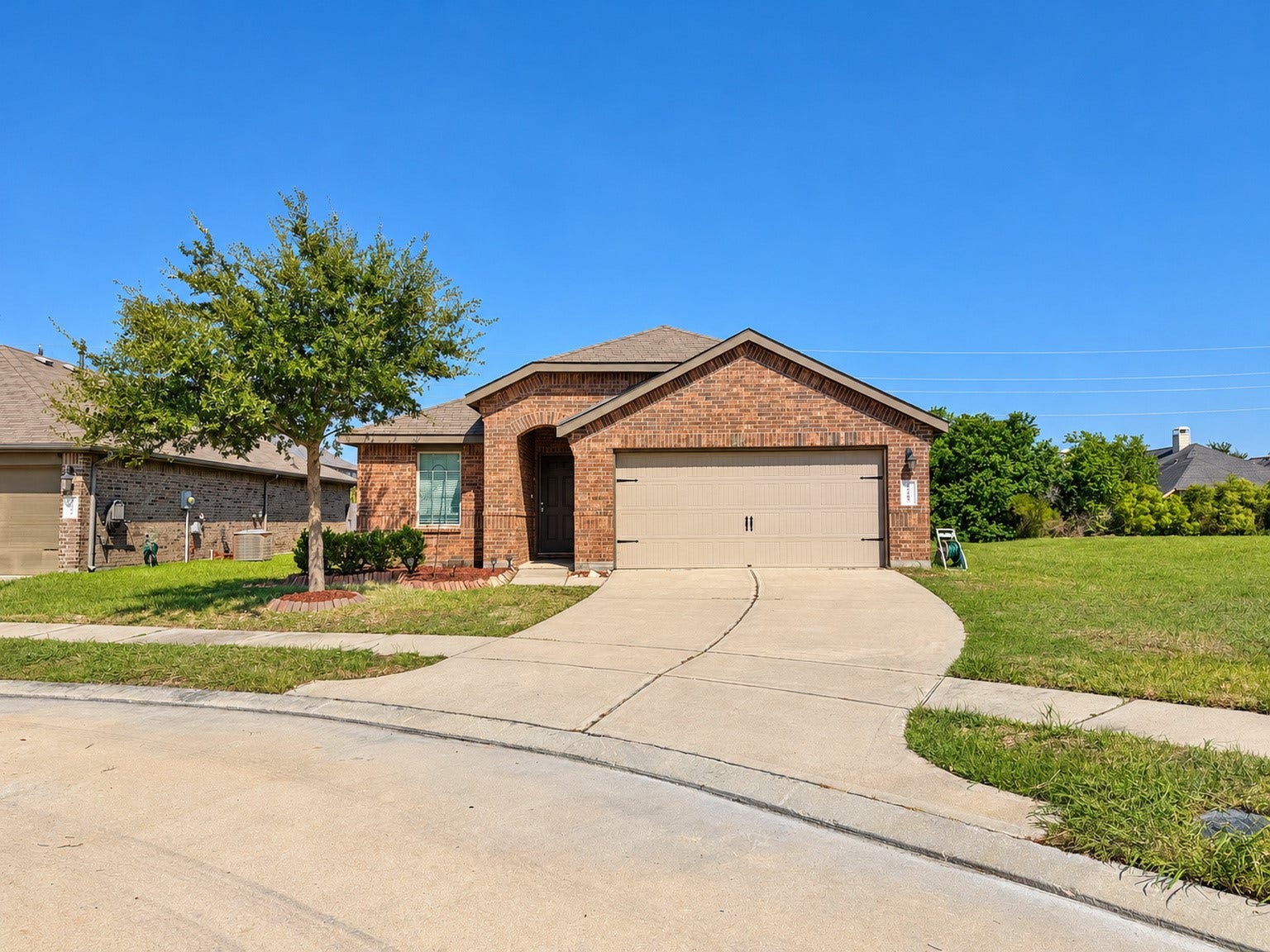 29202 Dunns Creek Court, Katy, TX 77494 Welcome home! This charming single-story brick home greets you with an arched covered entry, a mature shade tree, and an attached two-car garage.