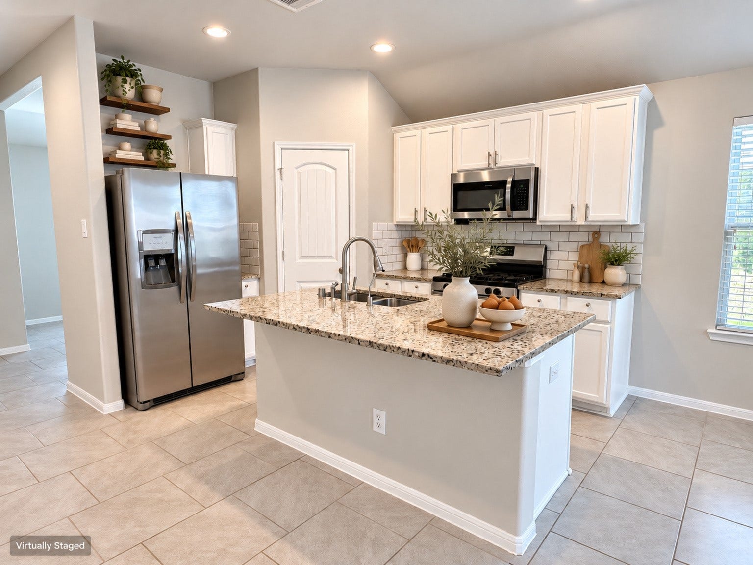 29202 Dunns Creek Court, Katy, TX 77494 Central kitchen island with a sink, generous counter space, and recessed lighting overhead.