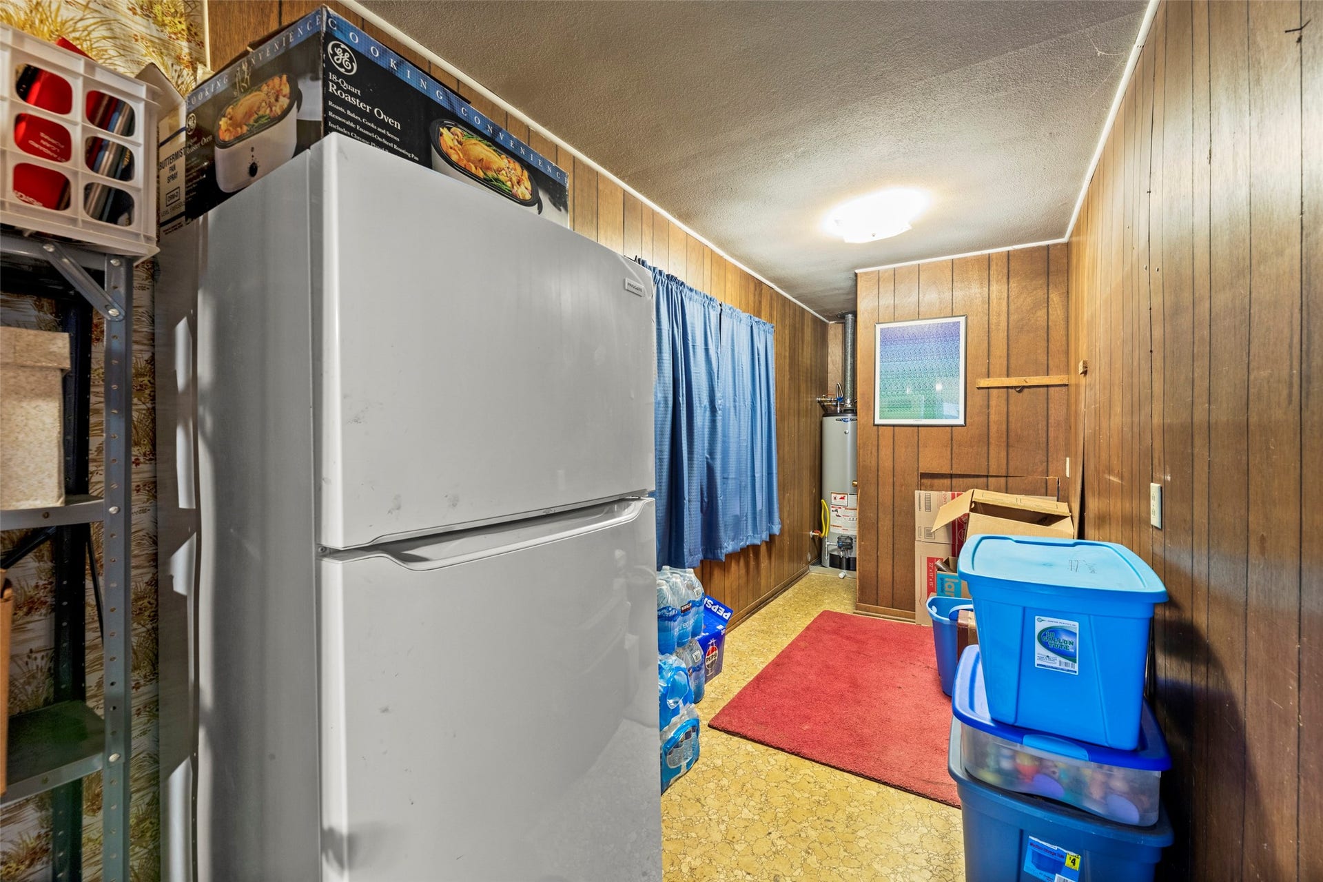 1542 Pilcik Road, Orchard, TX 77435 Storage area off kitchen that also leads to garage entry