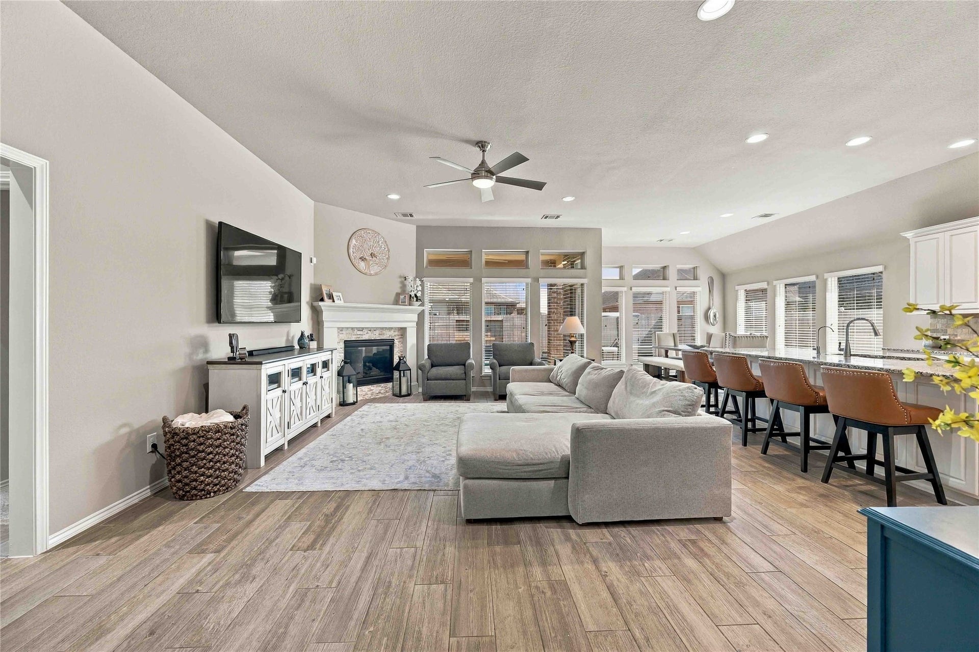 Enjoy the inviting open-concept floor plan where the spacious living room flows seamlessly into the kitchen, creating the perfect setting for entertaining guests and enjoying everyday moments. The connected layout offers an airy, welcoming feel with plenty of flexibility for relaxing, gathering, and making lasting memories.