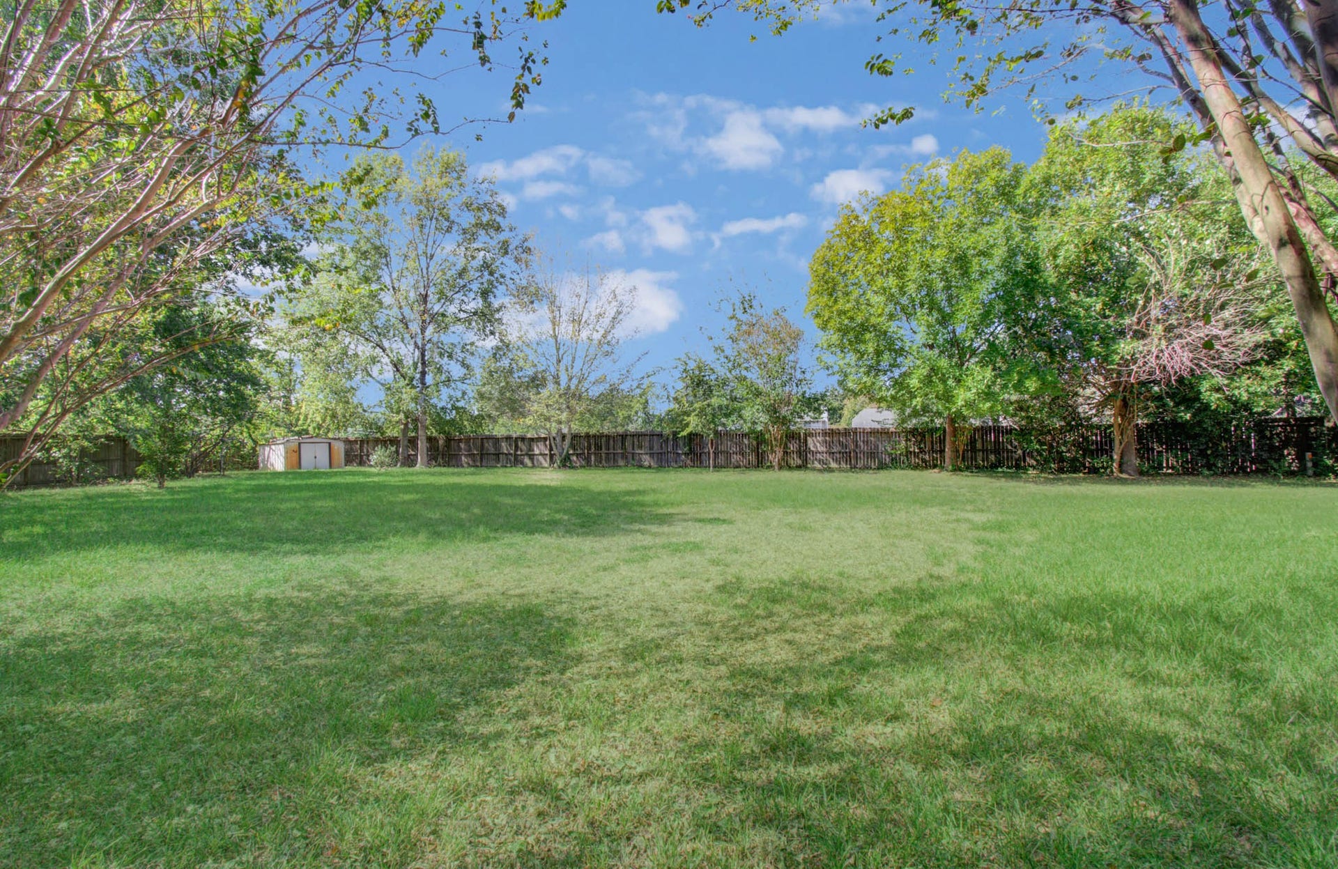 10003 Briarpark Trail Lane, Houston, TX 77064 Wide-open green space framed by mature trees offers a wonderful setting for backyard gatherings, playtime or simply enjoying a little breathing room.