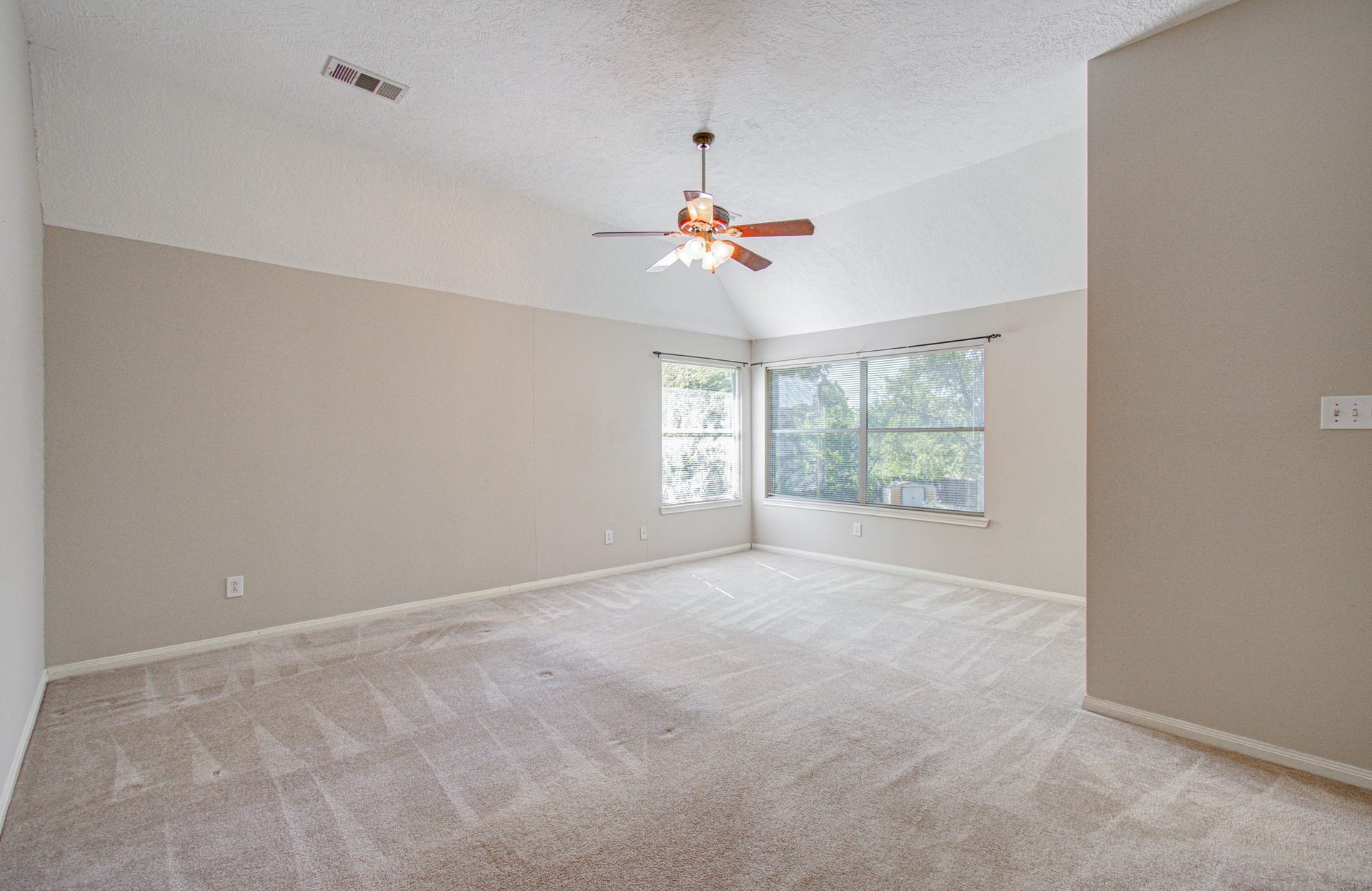 10003 Briarpark Trail Lane, Houston, TX 77064 Your own private retreat! Generously sized primary bedroom features multiple windows and direct access to a large ensuite bath.