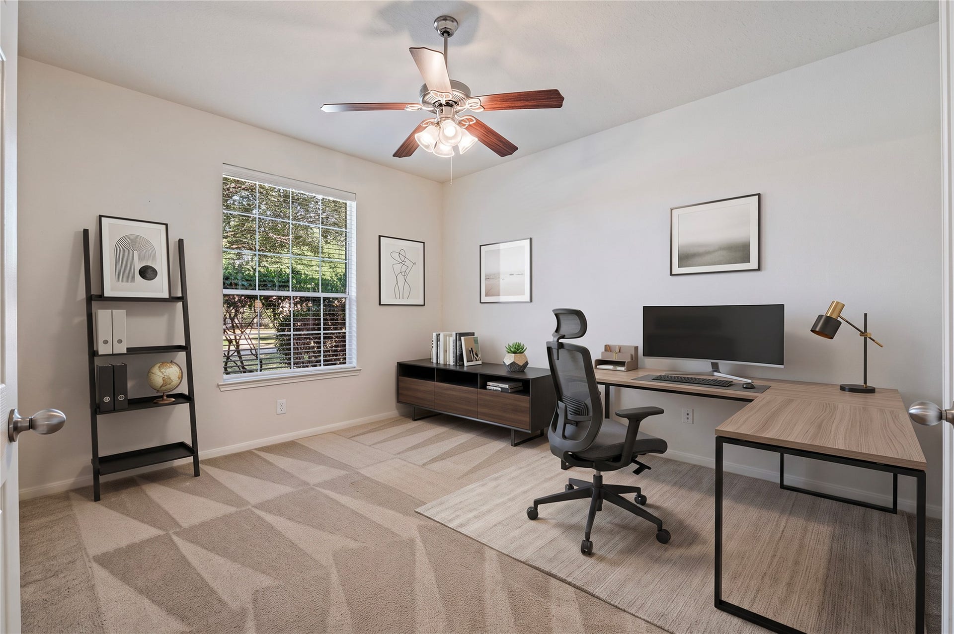 4404 Cypress Meadows Court, Dickinson, TX 77539 A private home office/study with double doors and a ceiling fan, ideal for working from home. Room is virtually staged.