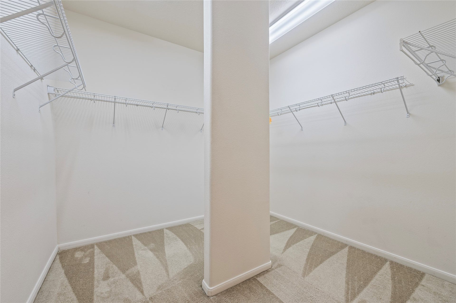 4404 Cypress Meadows Court, Dickinson, TX 77539 The oversized primary walk-in closet offers plenty of storage space.