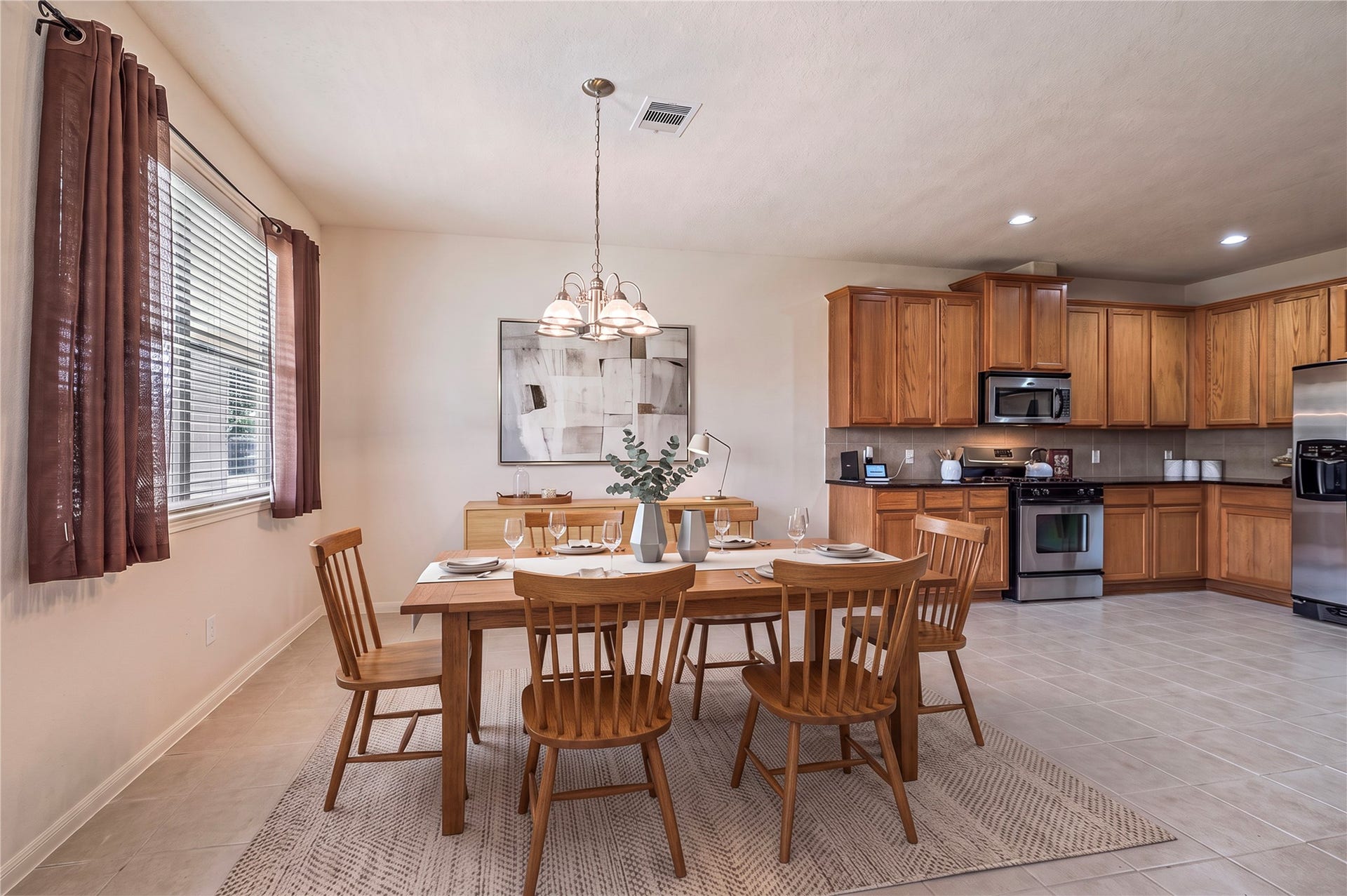 4404 Cypress Meadows Court, Dickinson, TX 77539 The spacious breakfast area with tile floors opens to the kitchen, great for casual meals. Room is virtually staged.