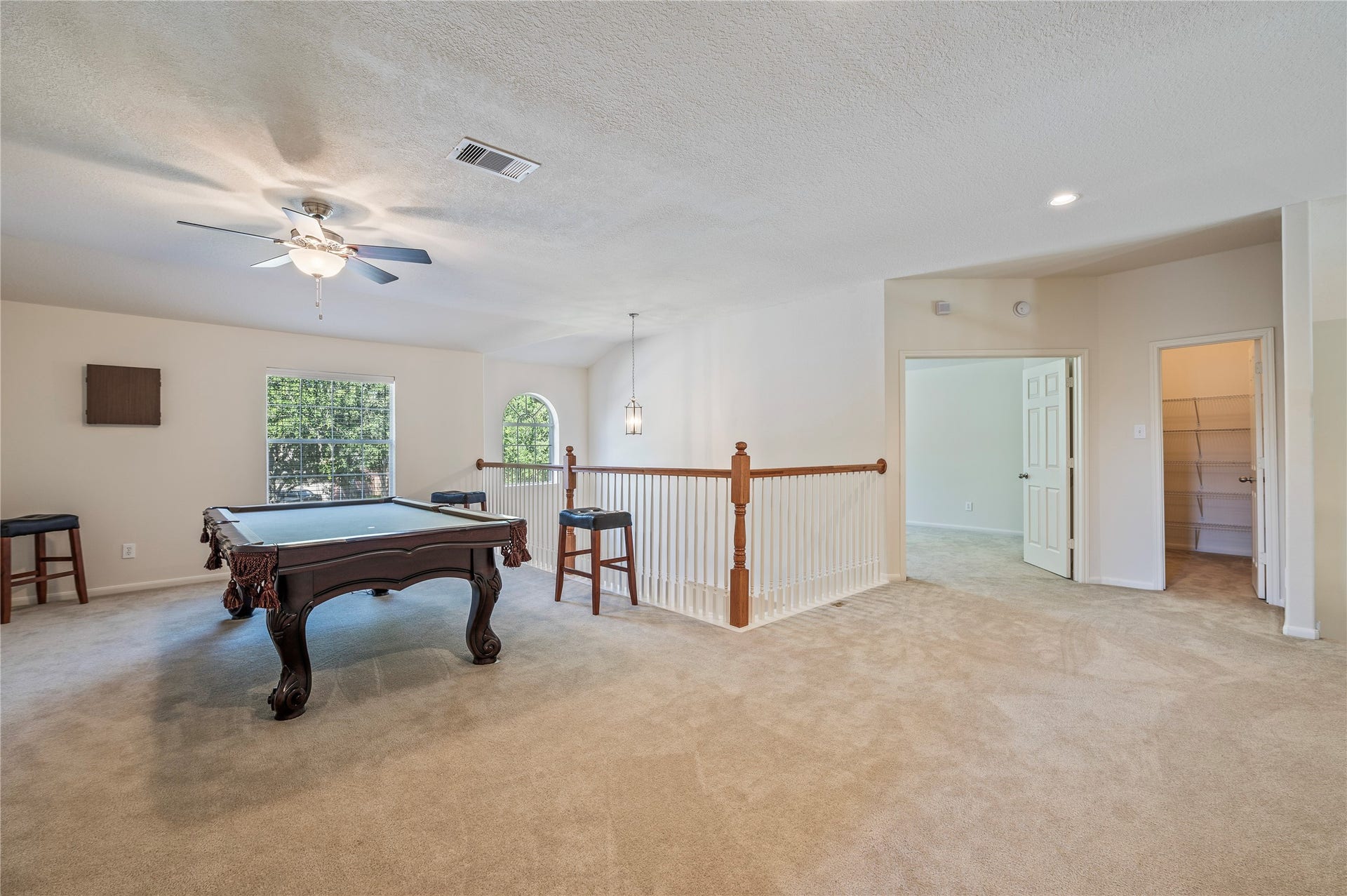 4404 Cypress Meadows Court, Dickinson, TX 77539 Another view of the huge upstairs game room, with room for a pool table, gaming, hobbies and more.