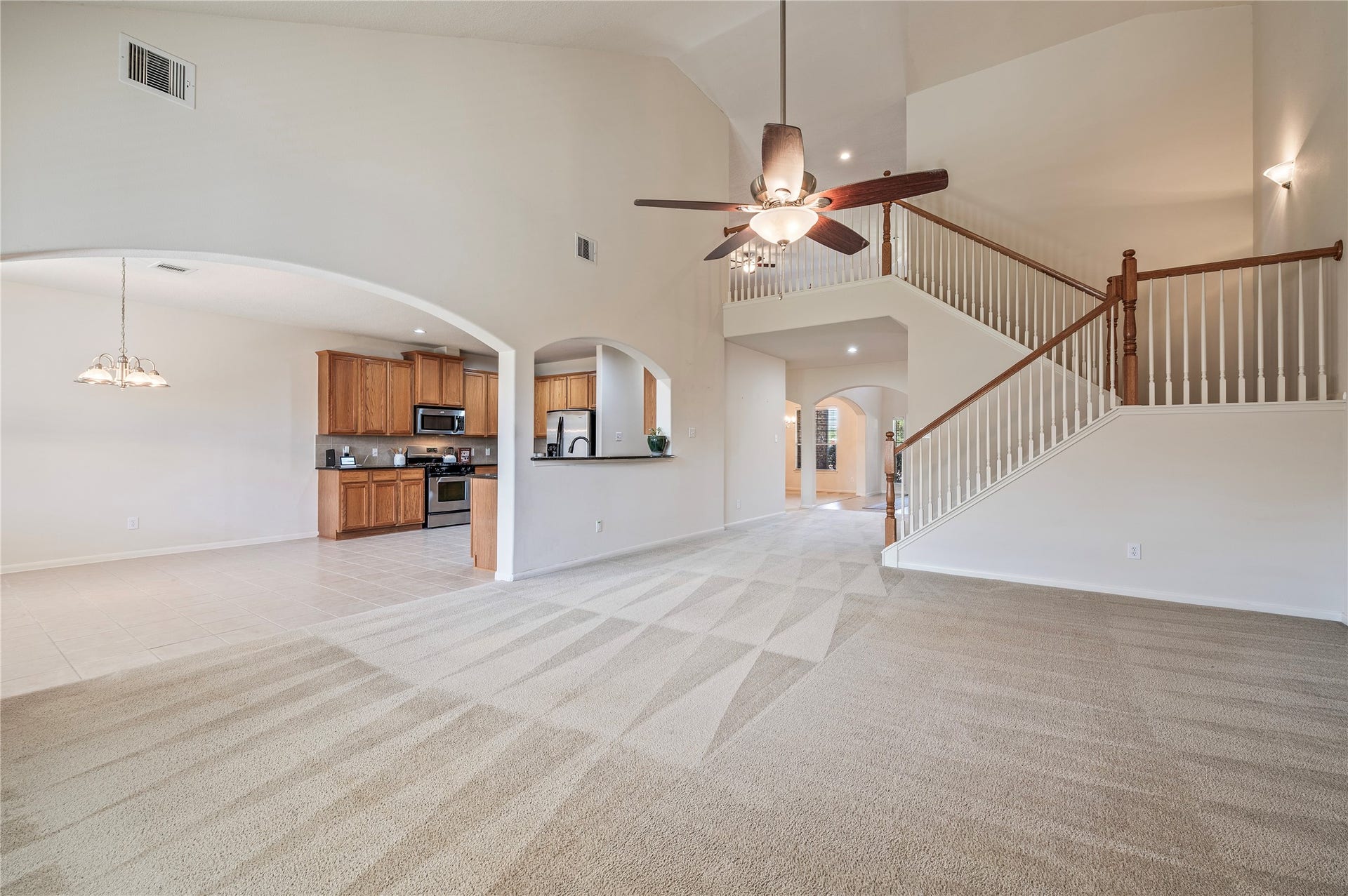 4404 Cypress Meadows Court, Dickinson, TX 77539 The family room opens directly to the breakfast area and kitchen, an easy layout for everyday living and entertaining.