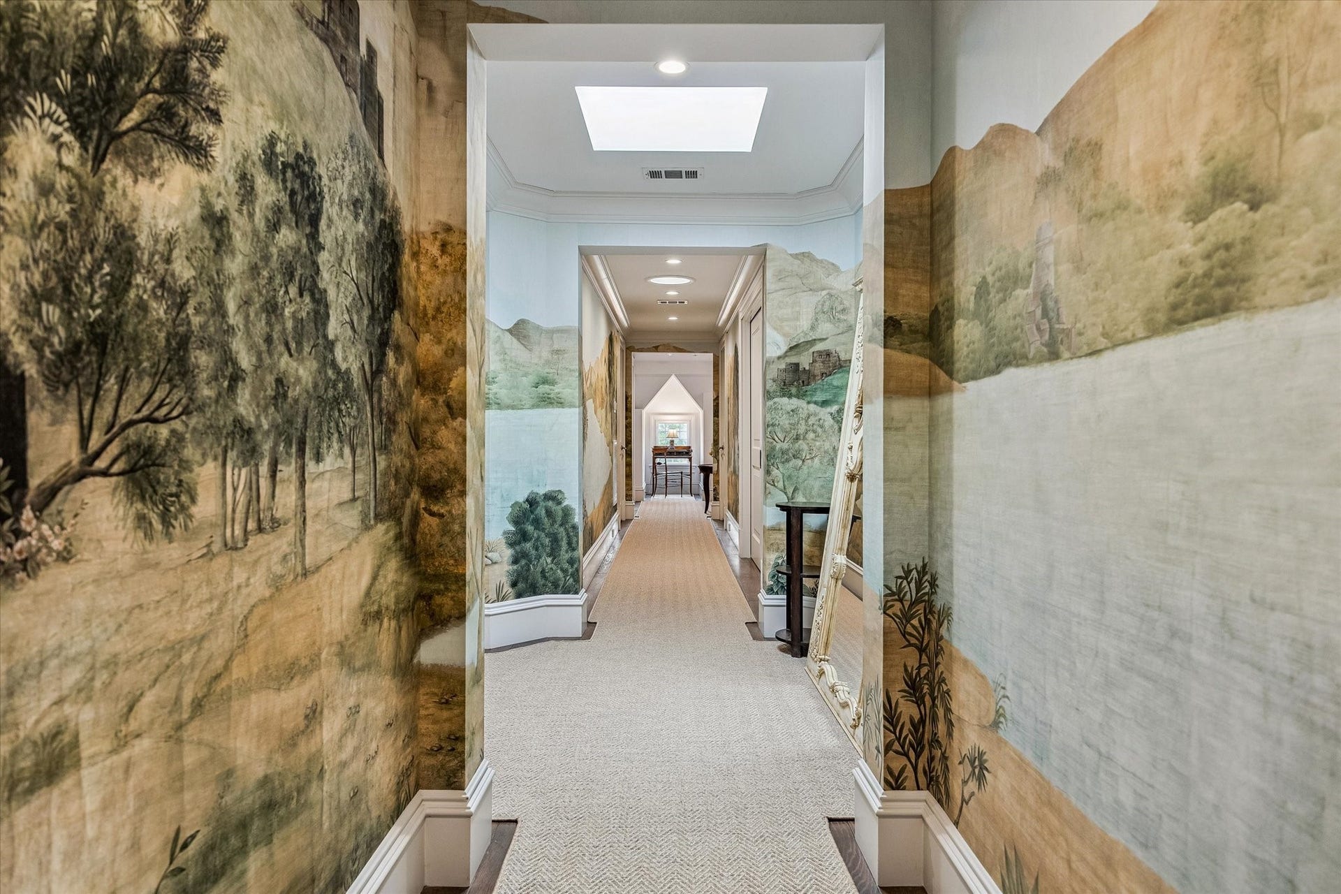 2158 Chilton Road, Houston, TX 77019 The third-floor hallway is elevated by a stunning panoramic muralArcadian Promenade by Iksel Decorative Arts, distributed by Schumachercreating a gallery-like experience. A conveniently located wet bar enhances the space, offering both function and style for guests and everyday living.