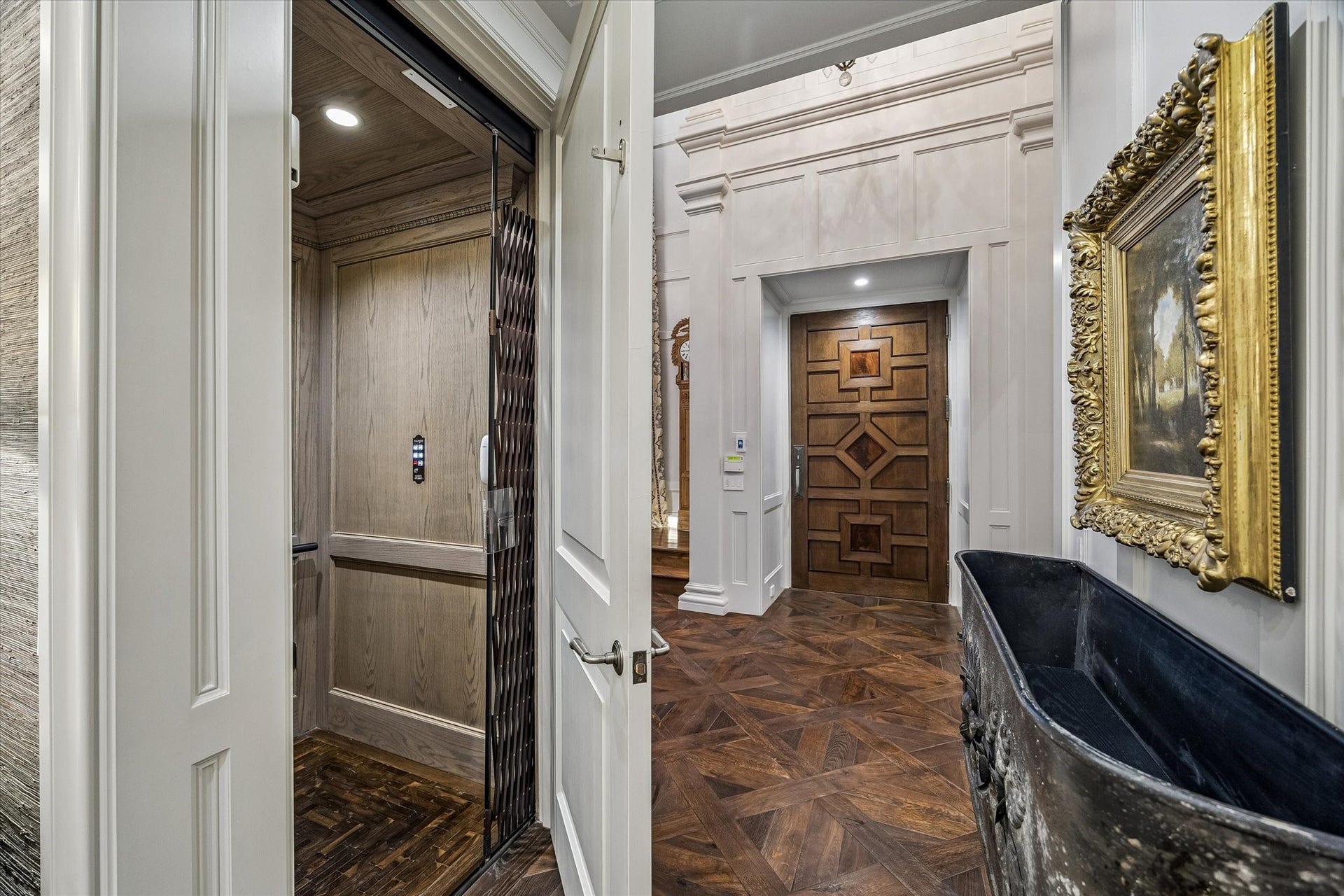 2158 Chilton Road, Houston, TX 77019 The private elevator, conveniently located off the entry, provides seamless access to all three levels of the home, combining luxury and functionality for effortless daily living.