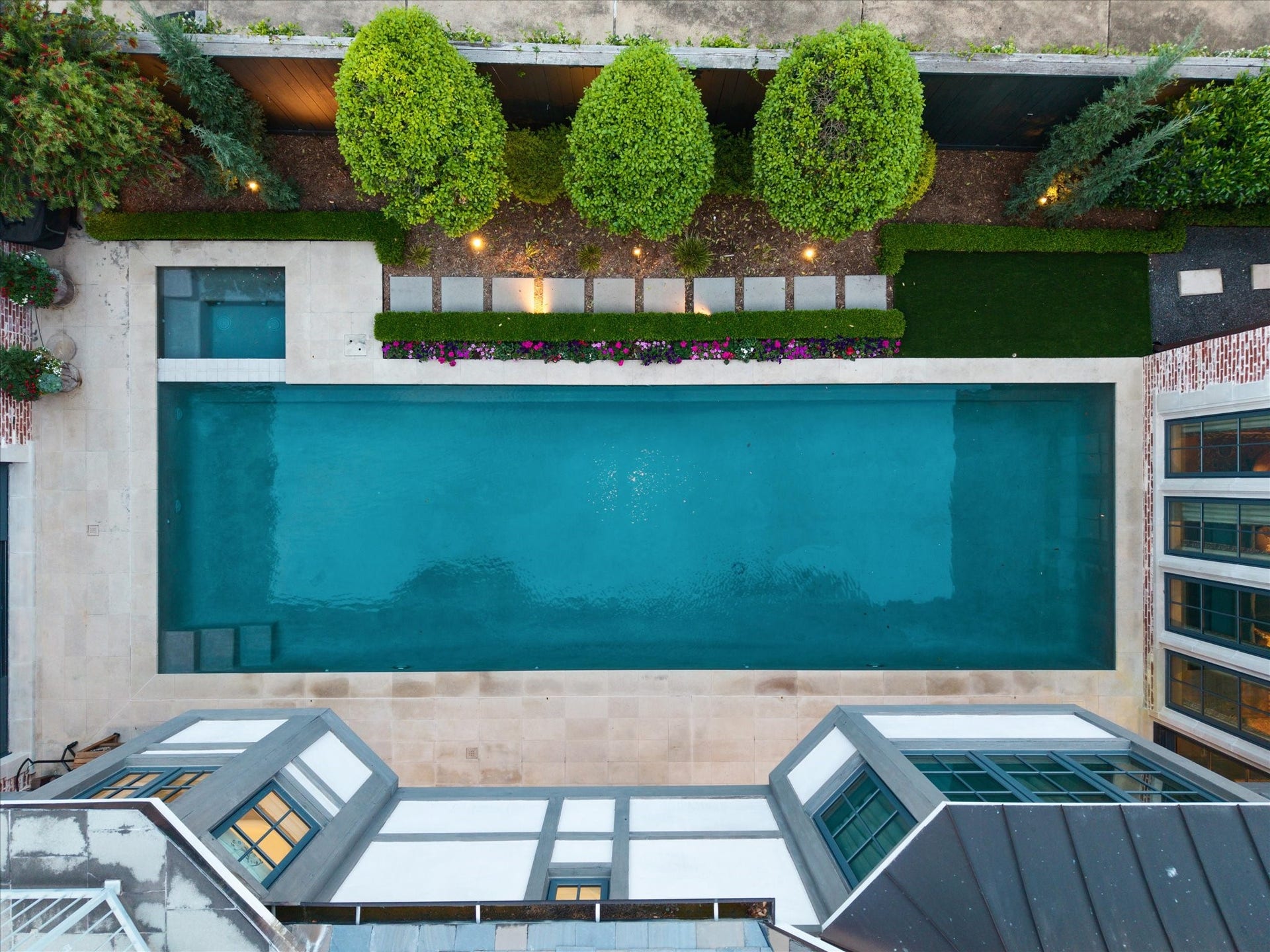 2158 Chilton Road, Houston, TX 77019 A serene outdoor oasis with pool, spa, and spacious entertaining areas surrounded by manicured grounds. Thoughtful details, including landscape lighting and a sprinkler system, make this backyard perfect for both everyday living and memorable gatherings.