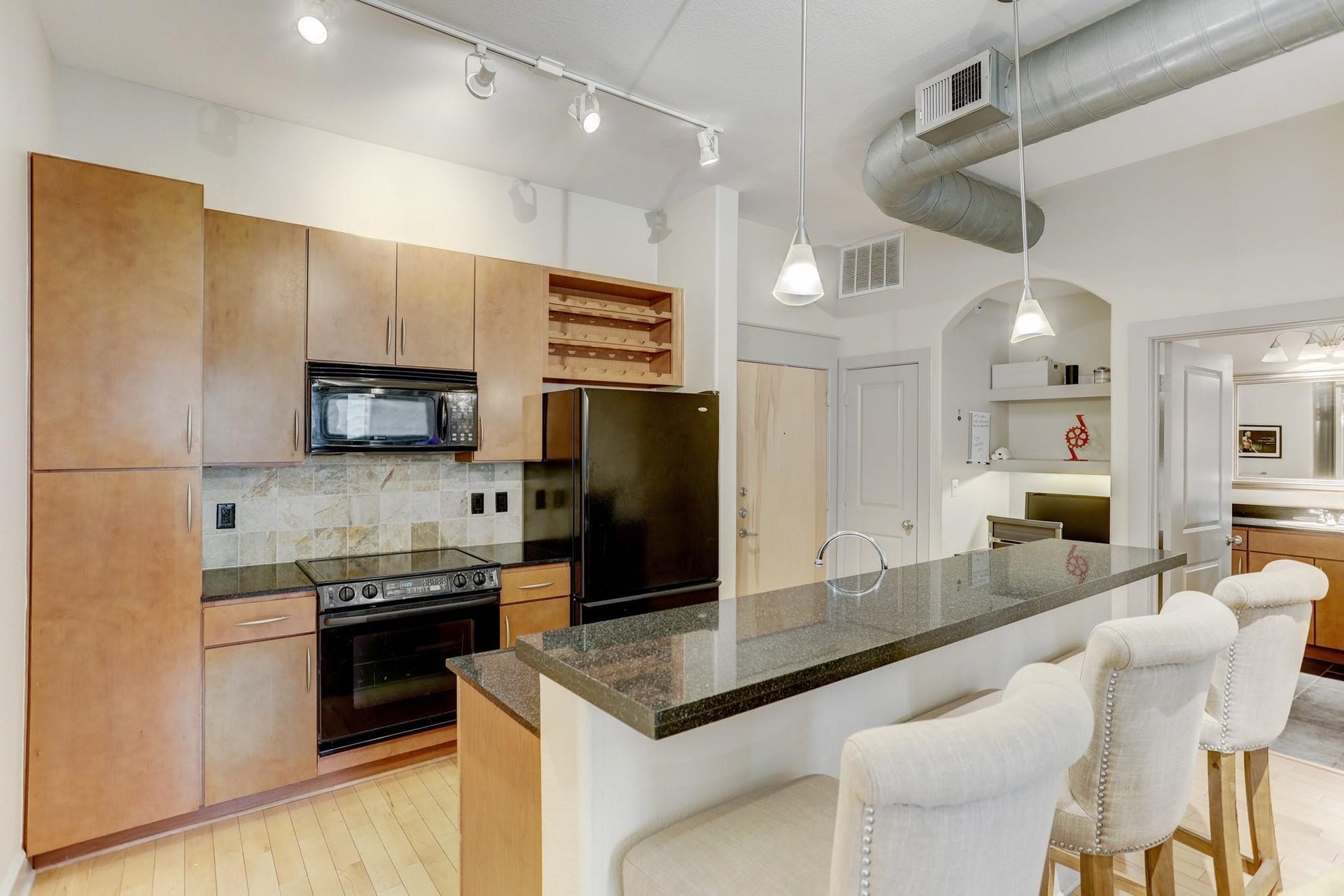 1901 Post Oak Boulevard, #3502, Houston, TX 77056 Island bar seating and wine rack included for a perfect Saturday with brand new refrigerator.