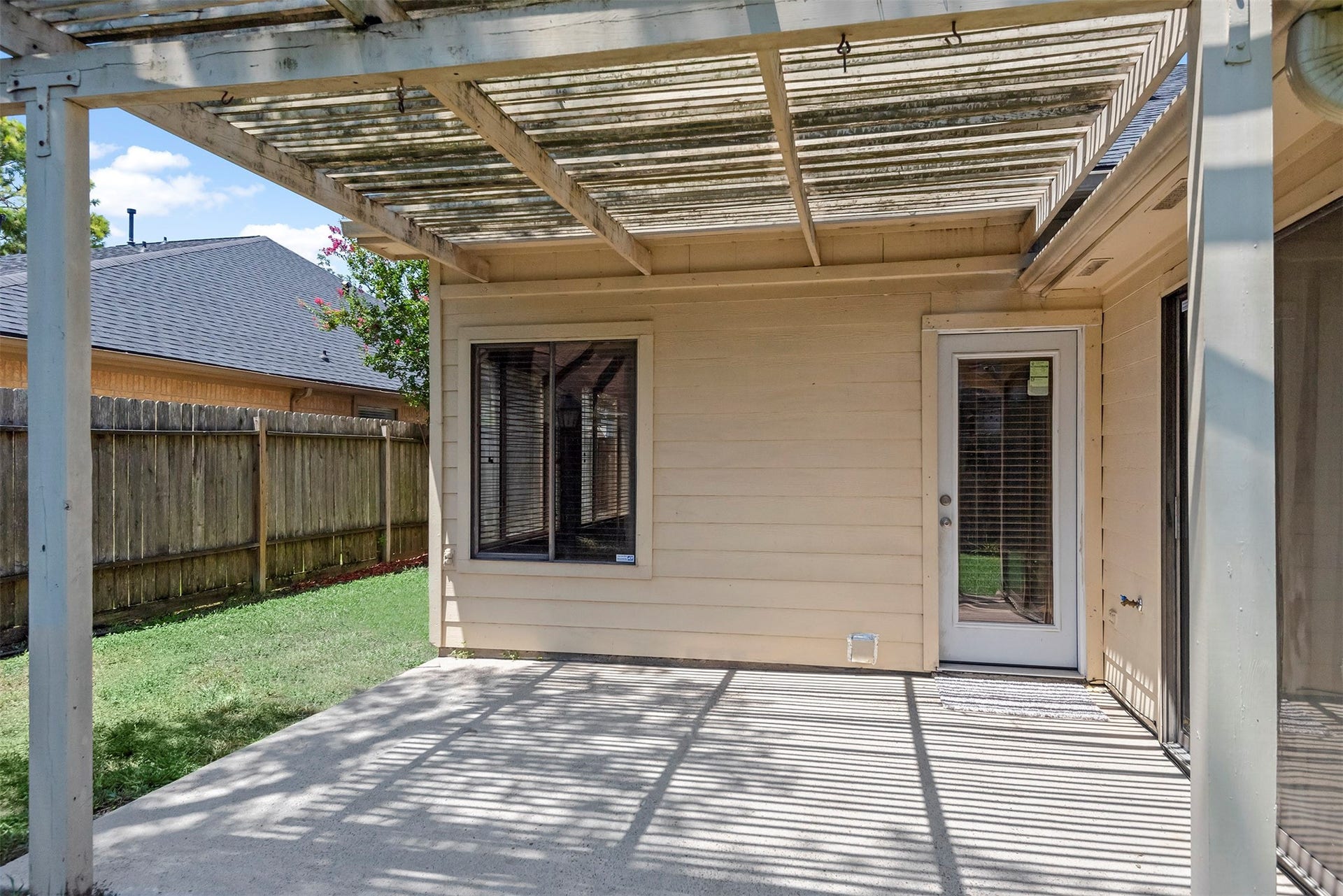 This is a great patio for a BBQ or a quaint spot for some colorful lawn chairs.