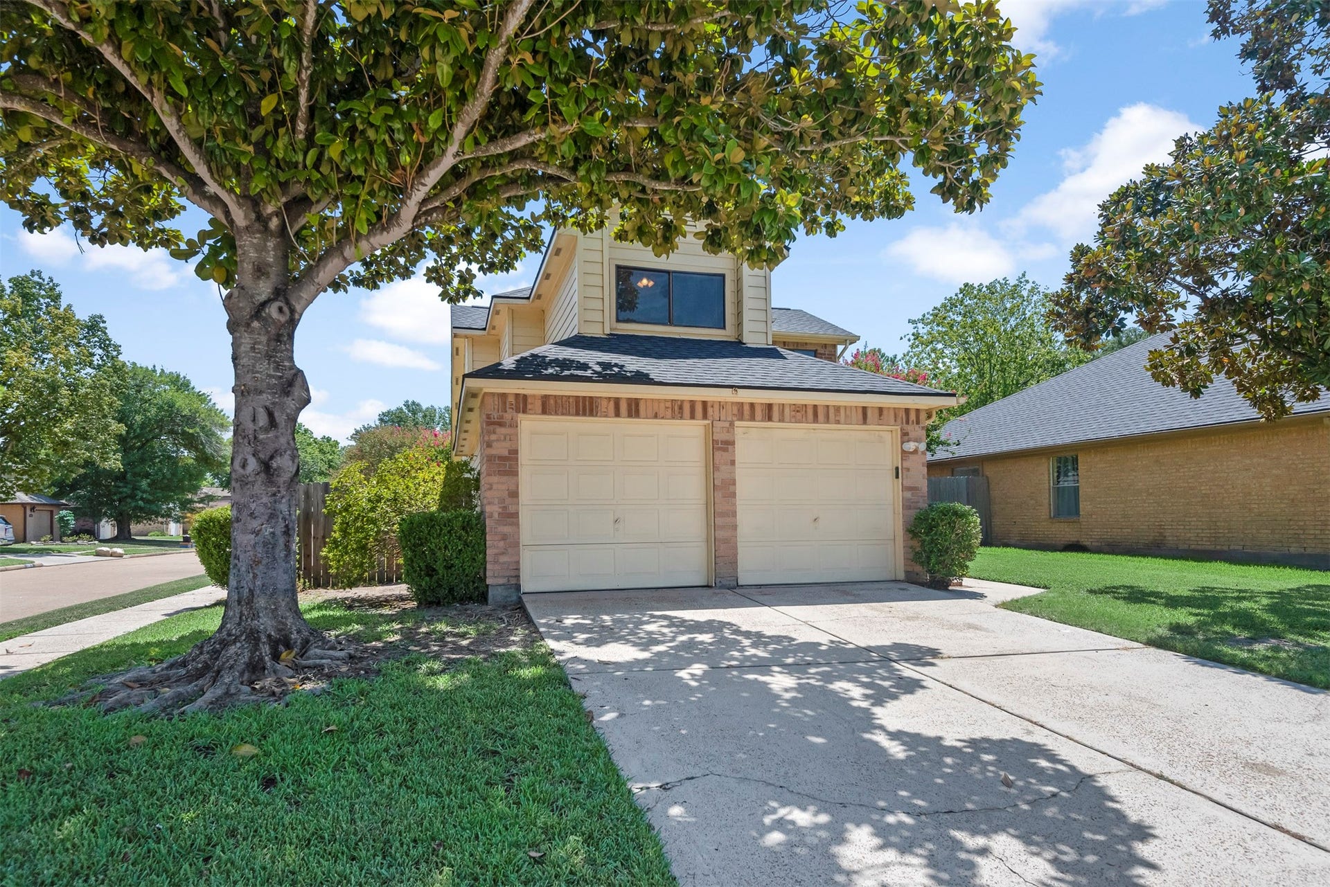 The home sits high on the corner lot just steps away from the community pool.