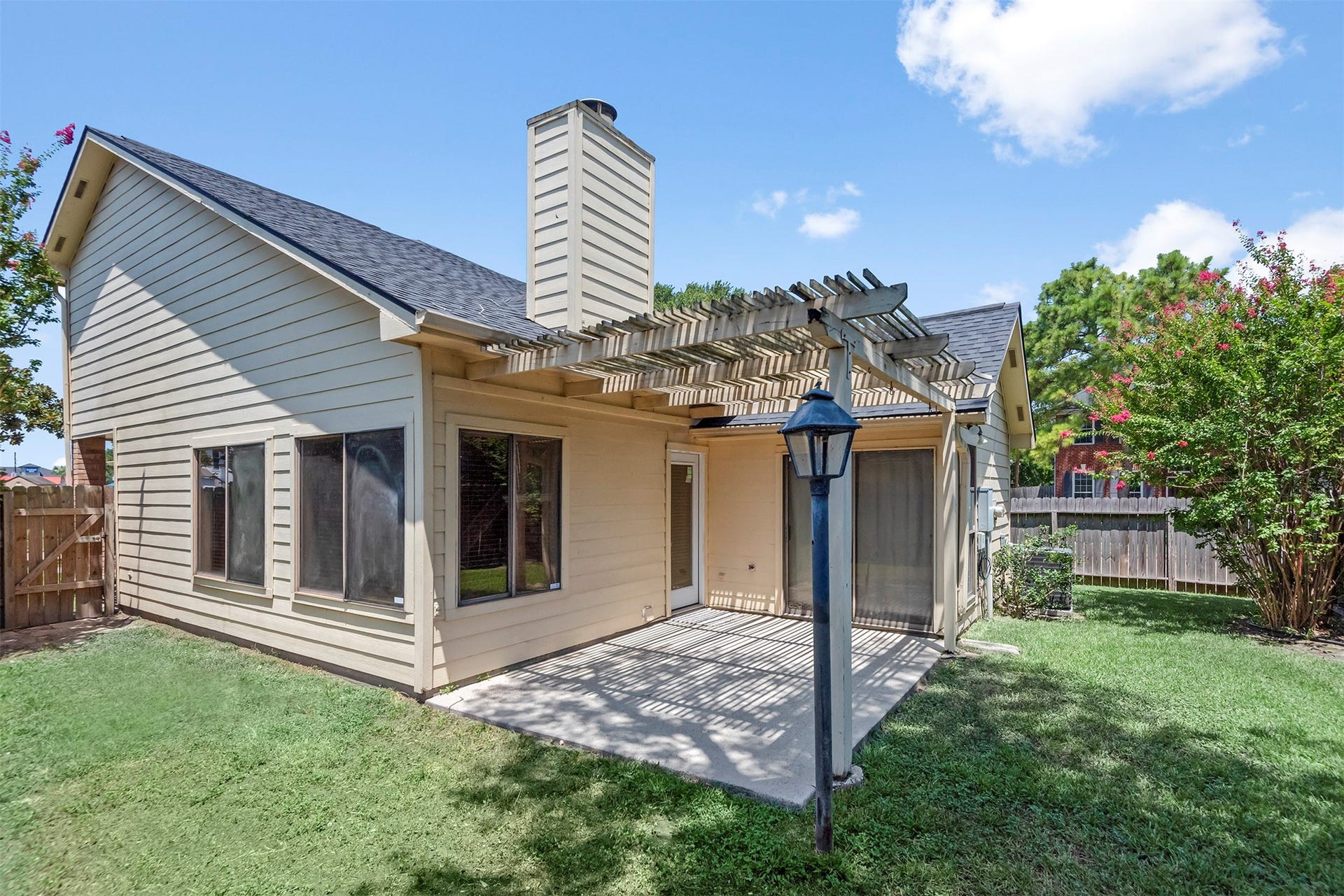 You can access the patio from the living area or the primary bedroom.