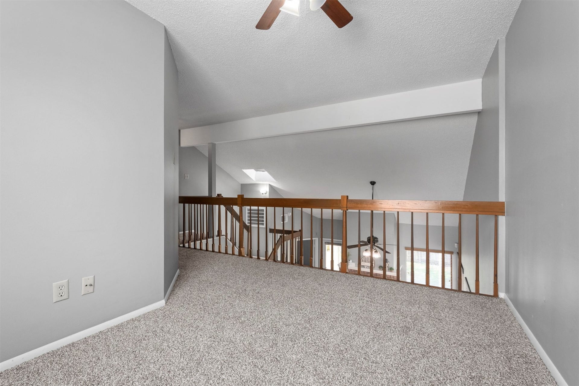 The upstairs game room is the perfect extra living space.  It's near the secondary bedrooms and located conveniently at the top of the stairs.