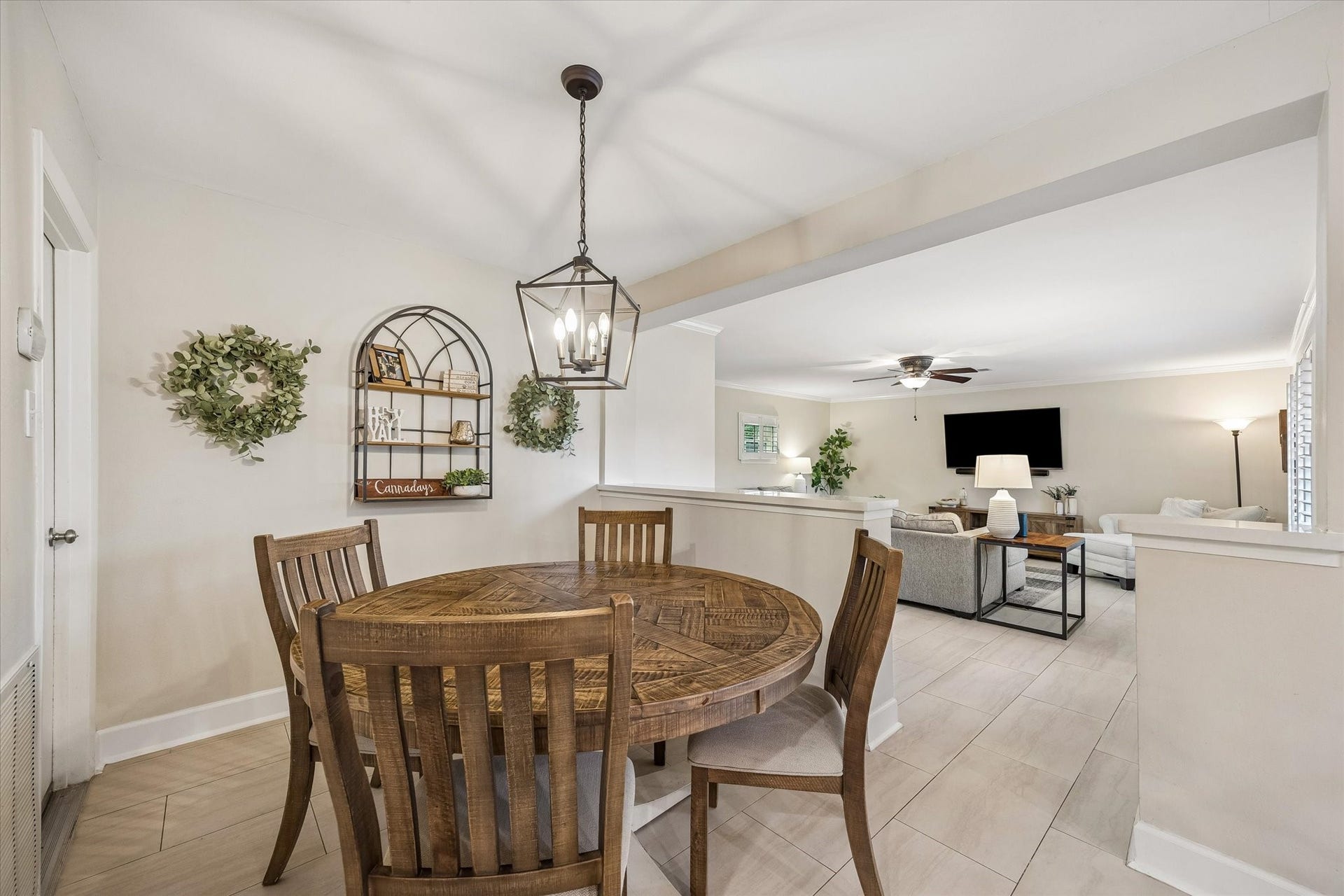 2318 Cheshire Lane, Houston, TX 77018 Breakfast area connects the kitchen with the spacious living room, creating a natural gathering point for everyday meals. Wide openings keep movement and conversation flowing between these frequently used spaces.