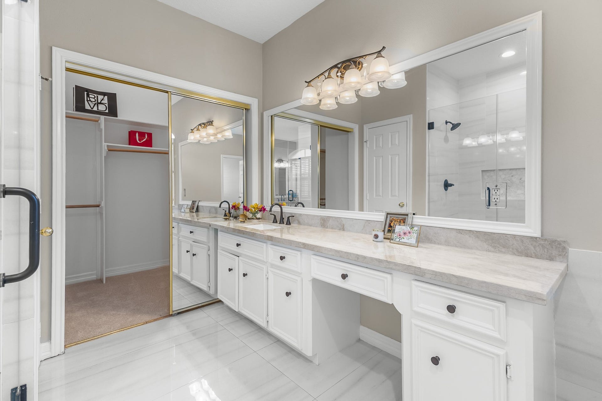 16314 Graven Hill Drive, Spring, TX 77379 An extended vanity with ample counter space and storage brings everyday convenience to the primary bath.
