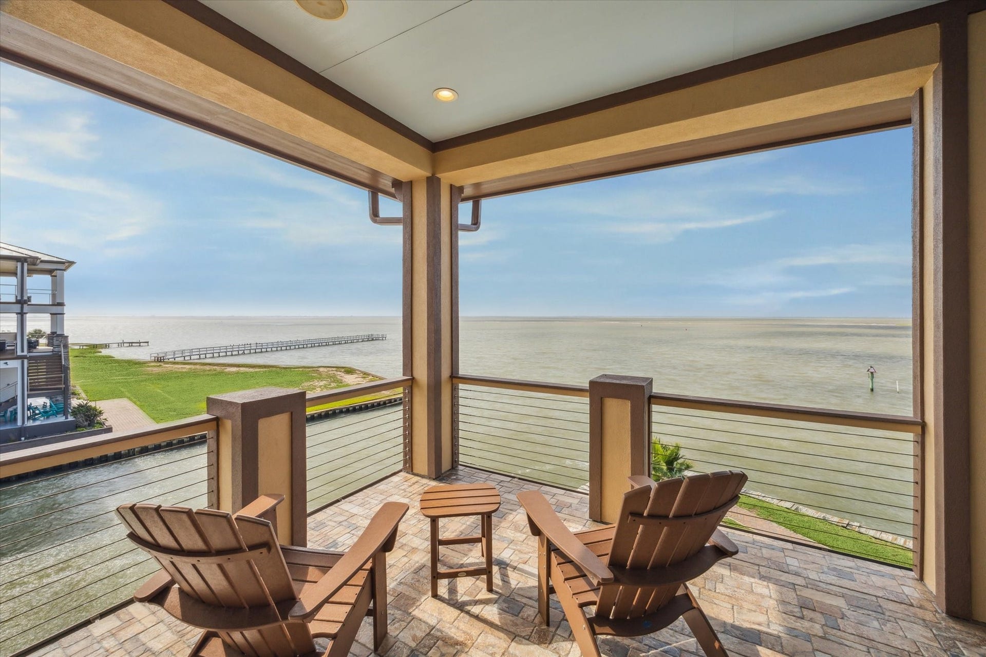 9 Happy Jack, Hitchcock, TX 77563 Tile flooring on covered decks on main living level and upper level...Just look at those views!
