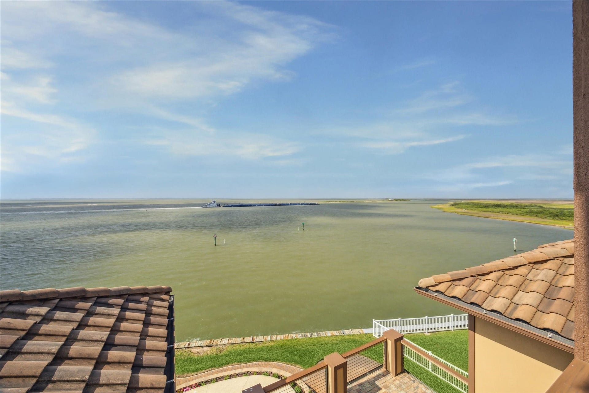 9 Happy Jack, Hitchcock, TX 77563 Direct deep water access to the Intracoastal Waterway. Generac 36 kw whole house stand-by generator covers all circuits
including pool equipment and boat house; entire system (including
transfer switch) is mounted on a raised platform 25 foot above mean tide
level