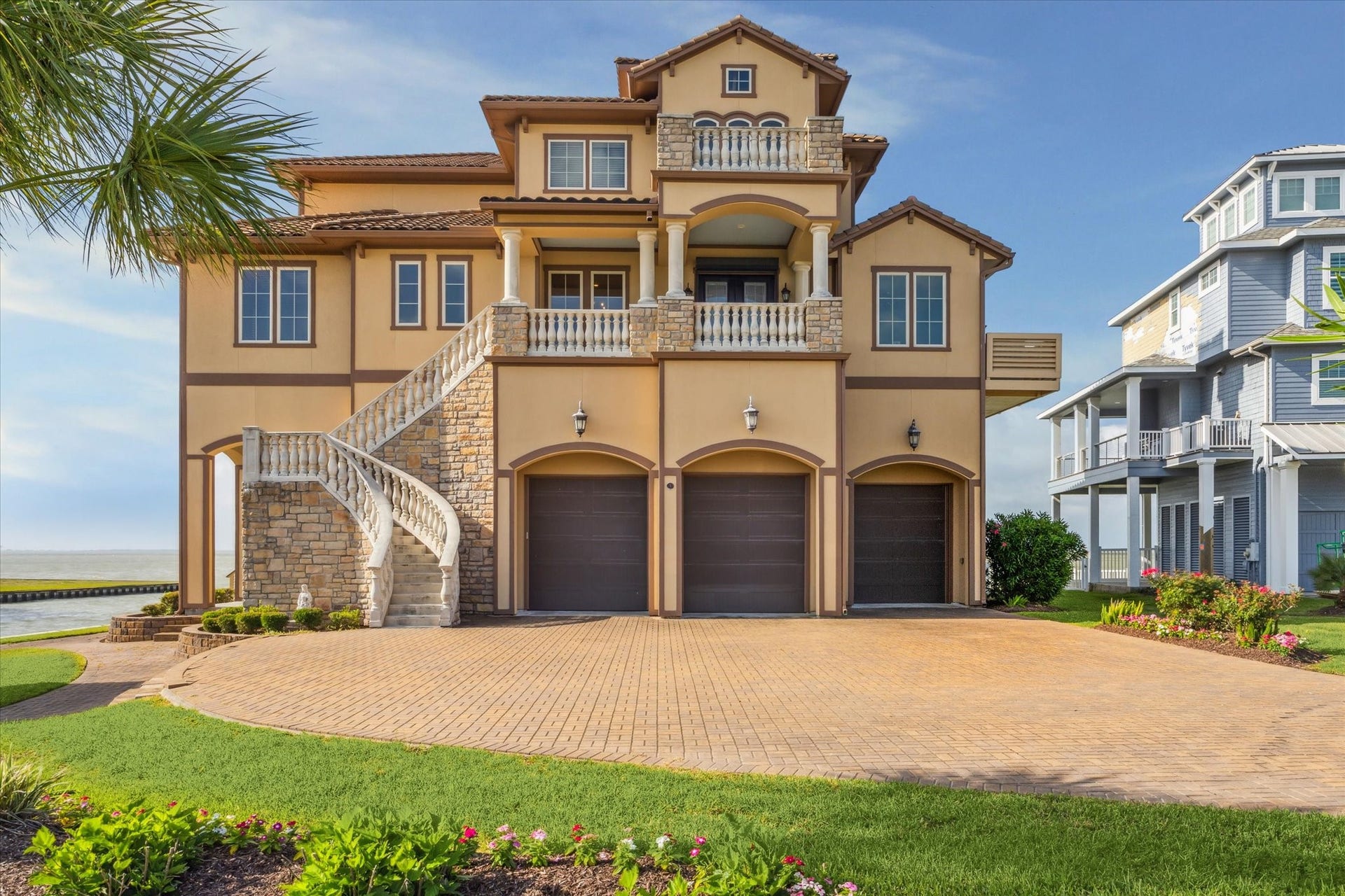 9 Happy Jack, Hitchcock, TX 77563 3 oversized 10 garage doors to access the driveway, plus 2 standard
8garage doors to the rear accessing the pool and bar area, to a fully
enclosed garage with sufficient space for any combination of up to 5 cars
or boat trailers, plus a golf cart area
