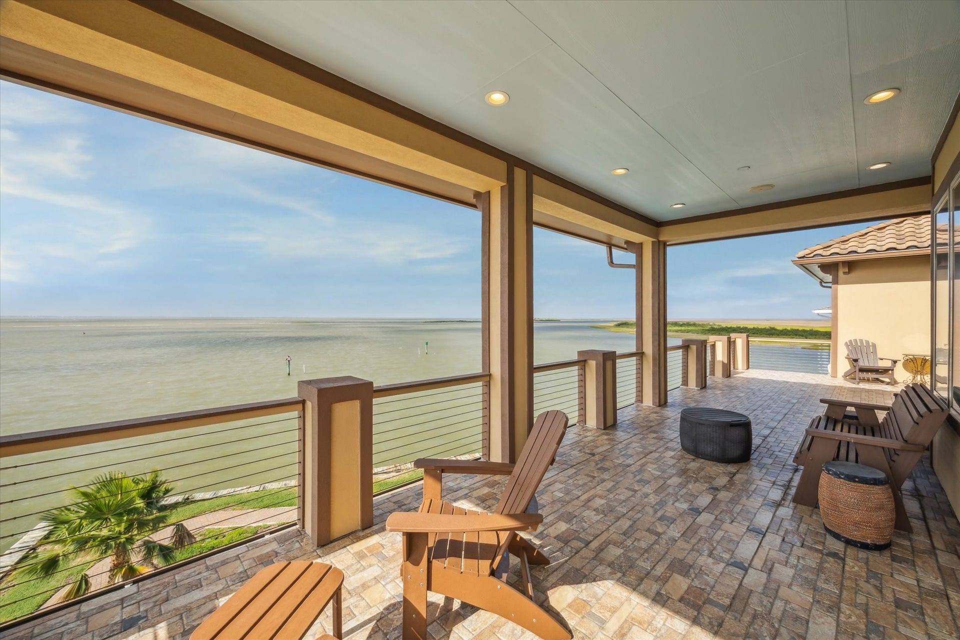 9 Happy Jack, Hitchcock, TX 77563 Upper level balcony overlooking West Galveston Bay, accessible by 2 of
the upper level bedrooms
