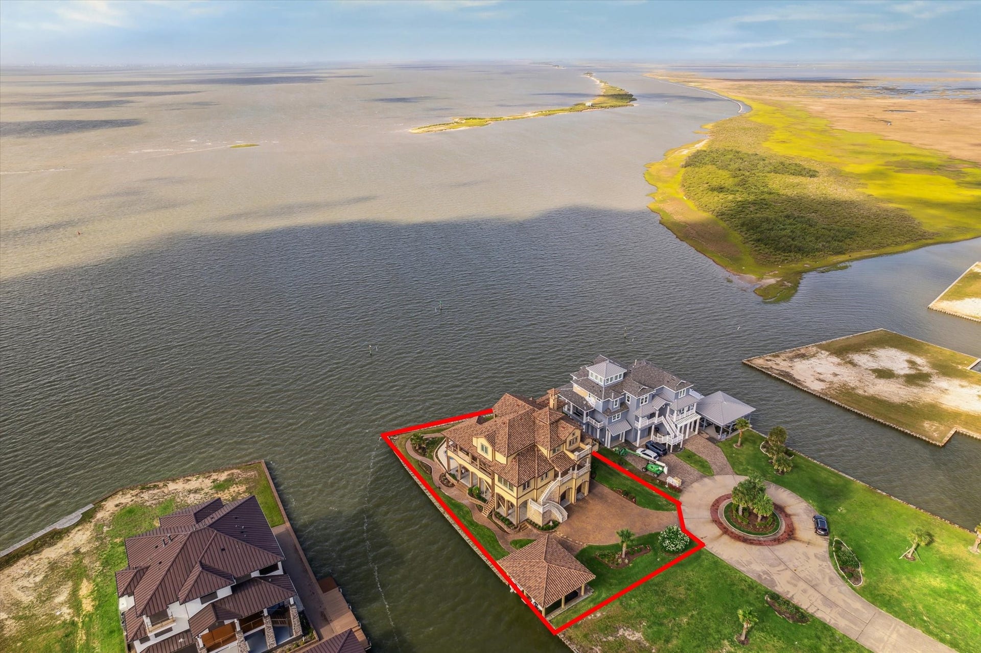 9 Happy Jack, Hitchcock, TX 77563 LOCATION is key and 9 Happy Jack IS IT if you're seeking a waterfront lifestyle in an exclusive gated waterfront community on West Galveston Bay. Located on the mainland, 12 miles to Galveston Island, 28 miles to the Beltway & 42 miles to downtown Houston!