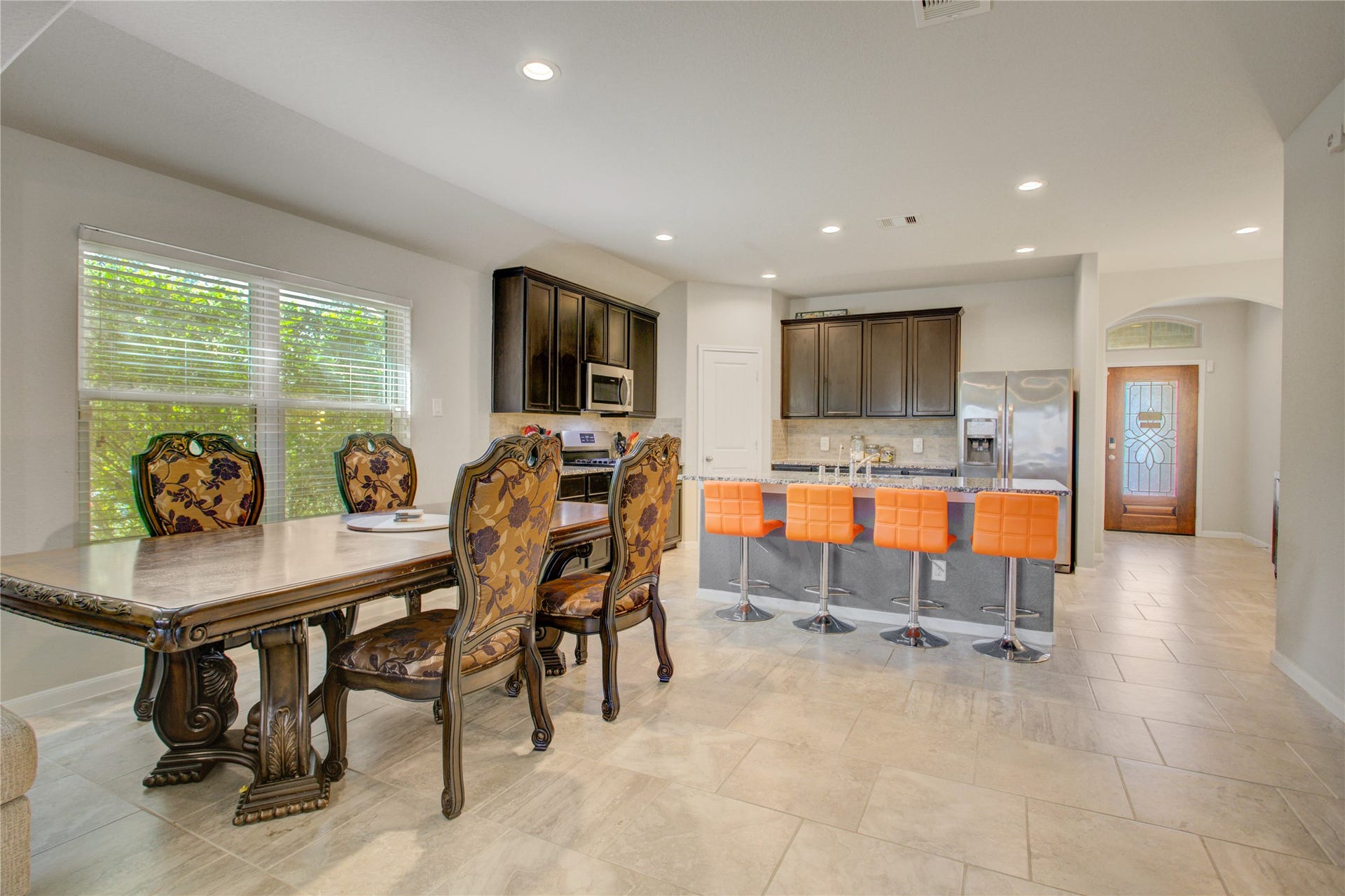 From casual breakfasts to special celebrations, this open layout makes gathering and entertaining effortless.