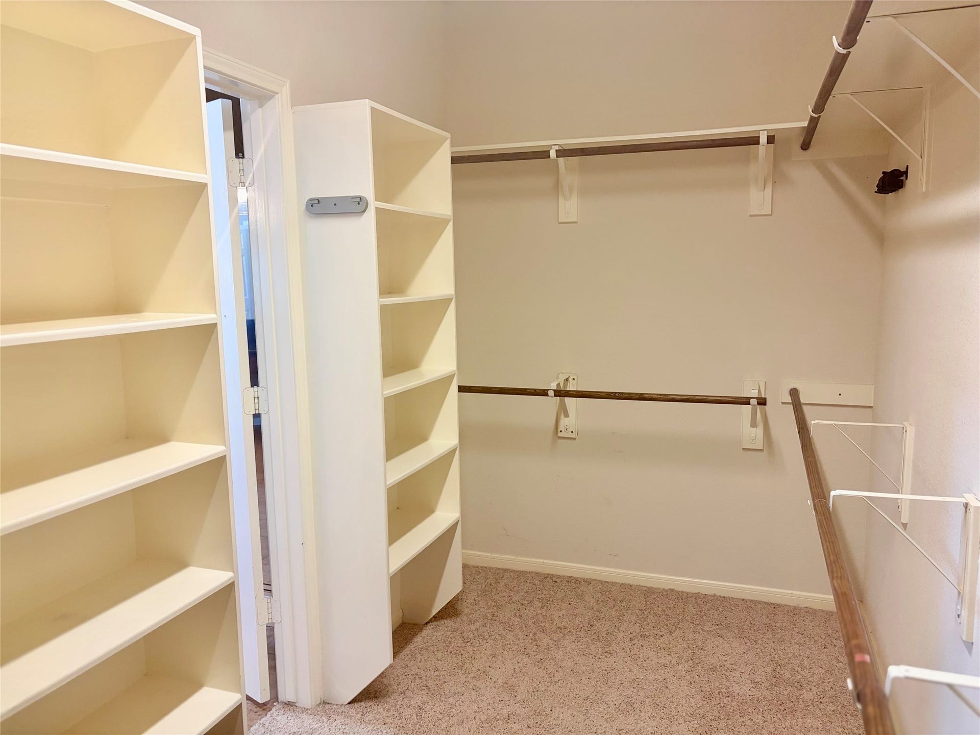 1230 Martinez Court, Friendswood, TX 77546 Very large primary bedroom closet, first floor.