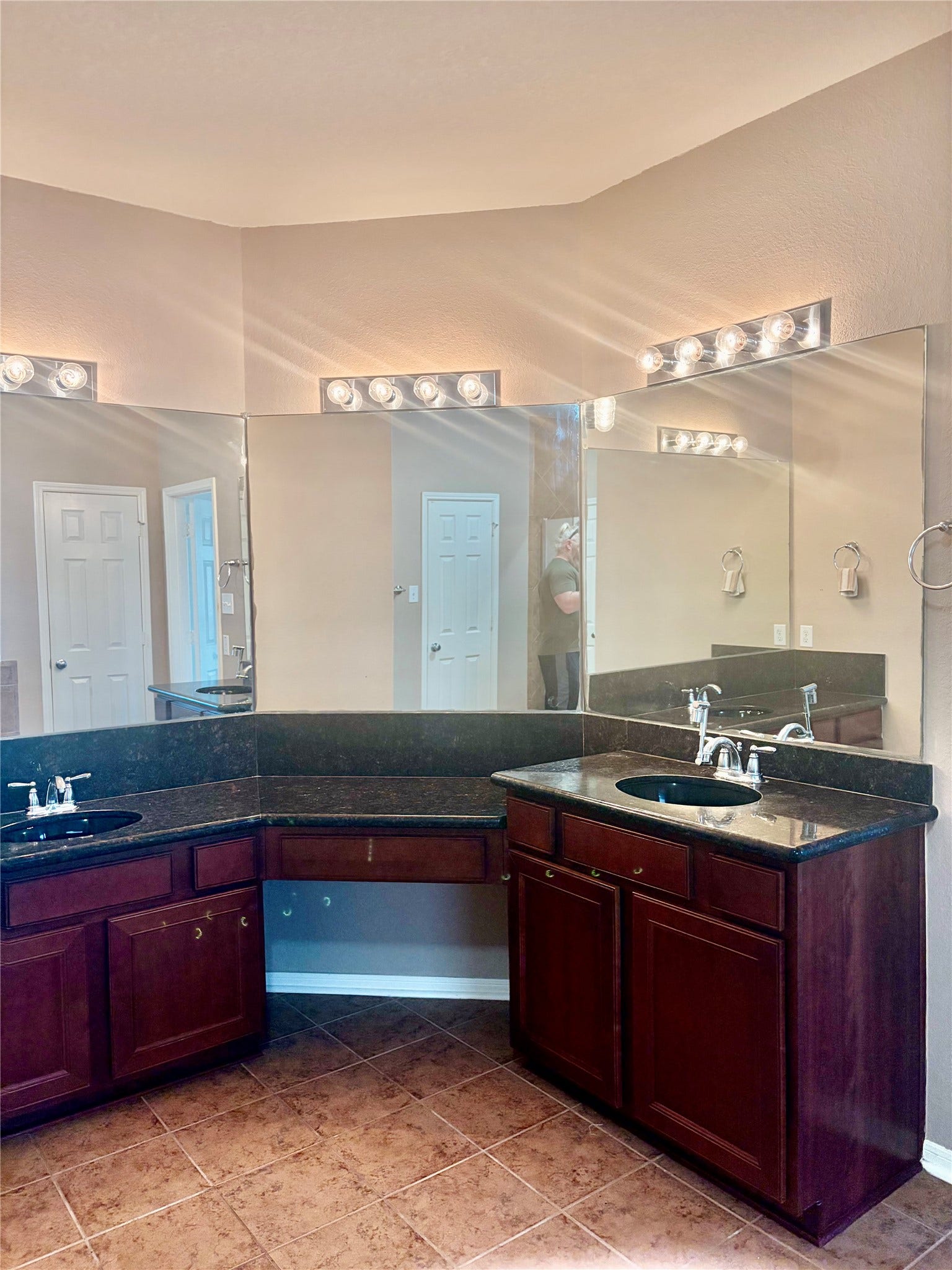 1230 Martinez Court, Friendswood, TX 77546 Primary Bath with granite countertops, two separate vanity areas, and a dressing area