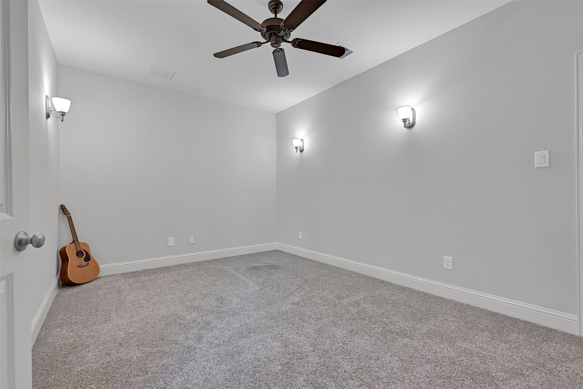 1321 Summer Field Lane, Friendswood, TX 77546 Just off the gameroom, the dedicated media room is ready for movie nights, gaming, or binge-watching your favorite shows. Sconce lighting, plush carpeting, and a tucked-away location create a theater-like atmosphere, while the generous dimensions easily accommodate multiple rows of seating.