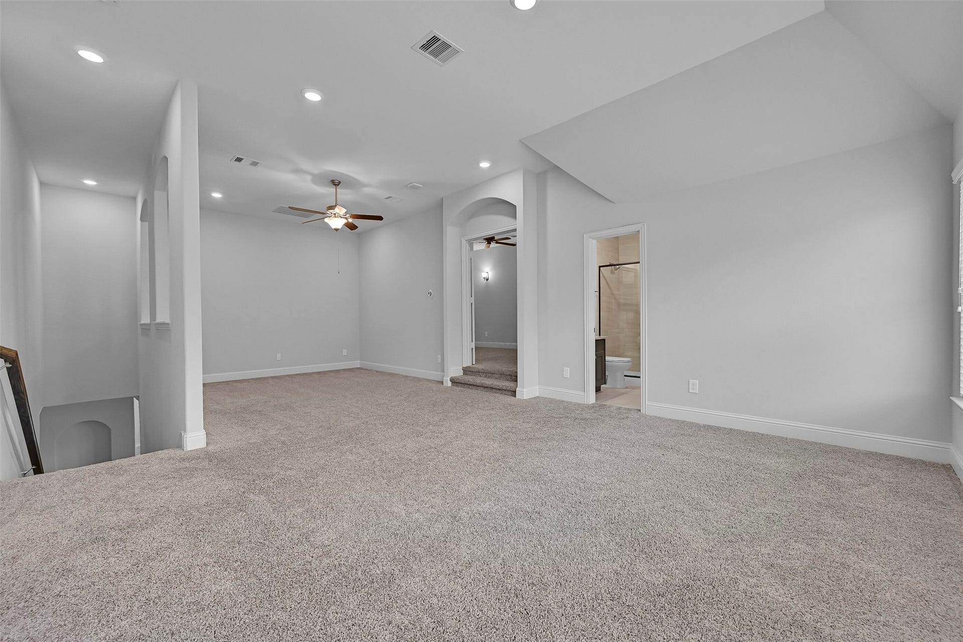 1321 Summer Field Lane, Friendswood, TX 77546 A rare and highly desirable floorplan places all four bedrooms & three full baths on the first floor, allowing the entire second level to function as a private retreat. This expansive gameroom offers endless flexibility as a second living area, playroom, or game room. Large windows fill the space with natural light and create the perfect gathering space away from the main living areas below.
