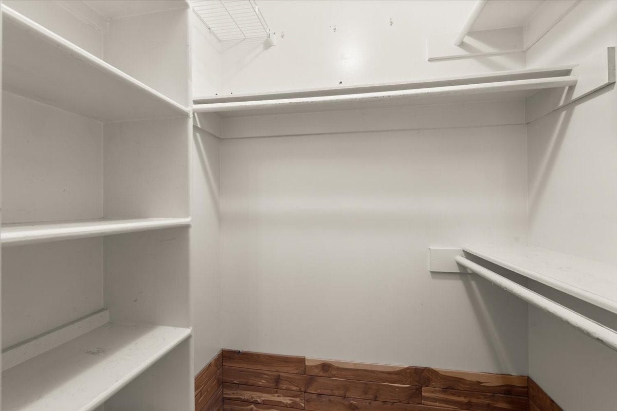 One of two closets in primary bathroom