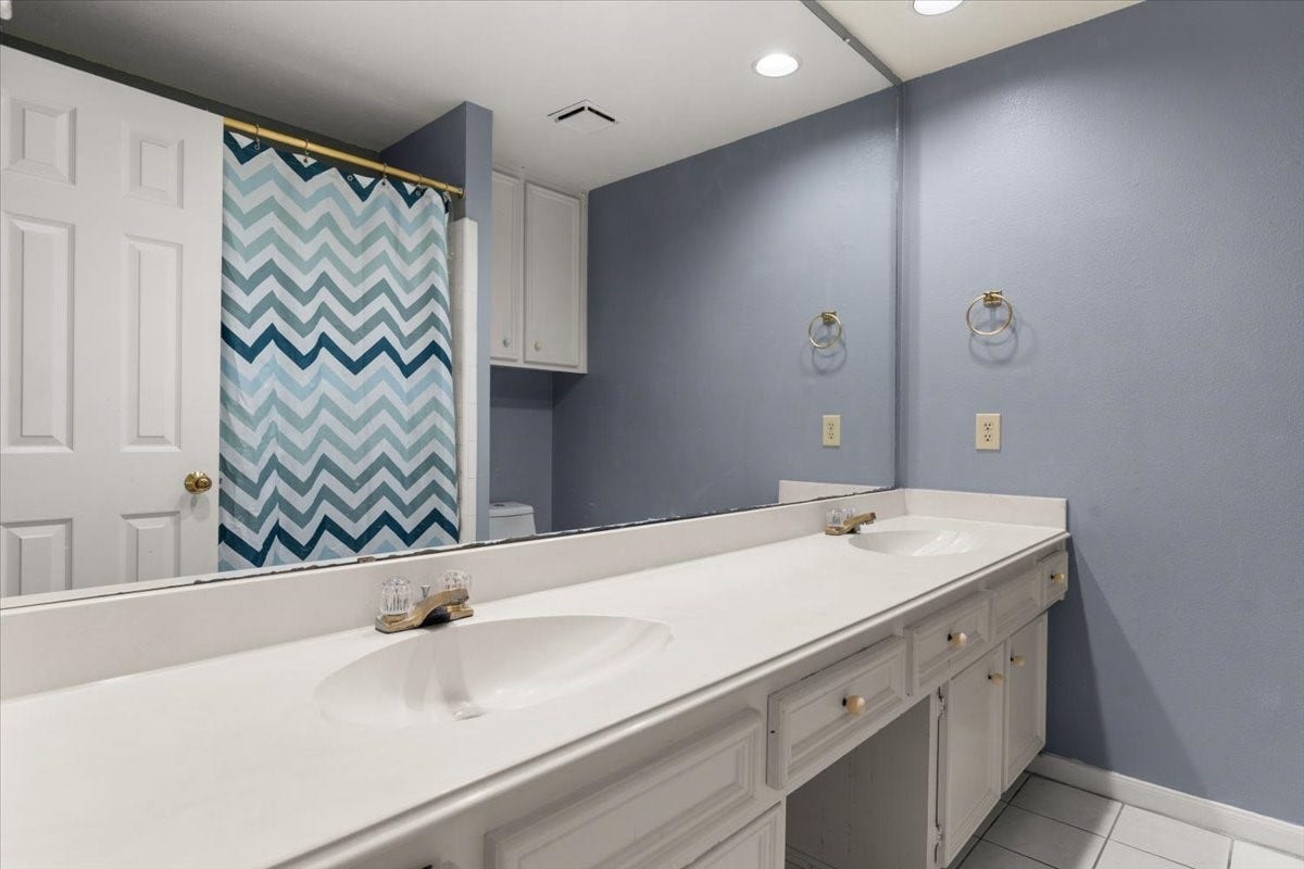 Convenient Guest Bathroom  Ideally located just off the living area and near the secondary bedrooms.