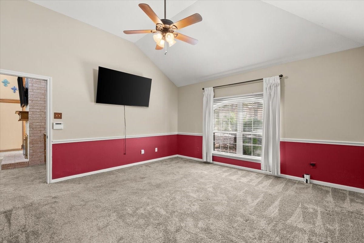 Enjoy a comfortable primary bedroom featuring large windows, convenient access to the private primary bathroom, and a desirable location just steps from the main living area.