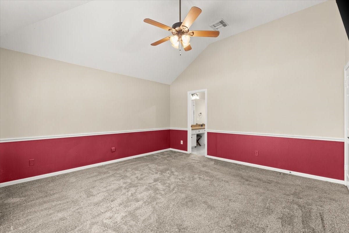Spacious primary retreat that has convenient direct access to the ensuite bathroom