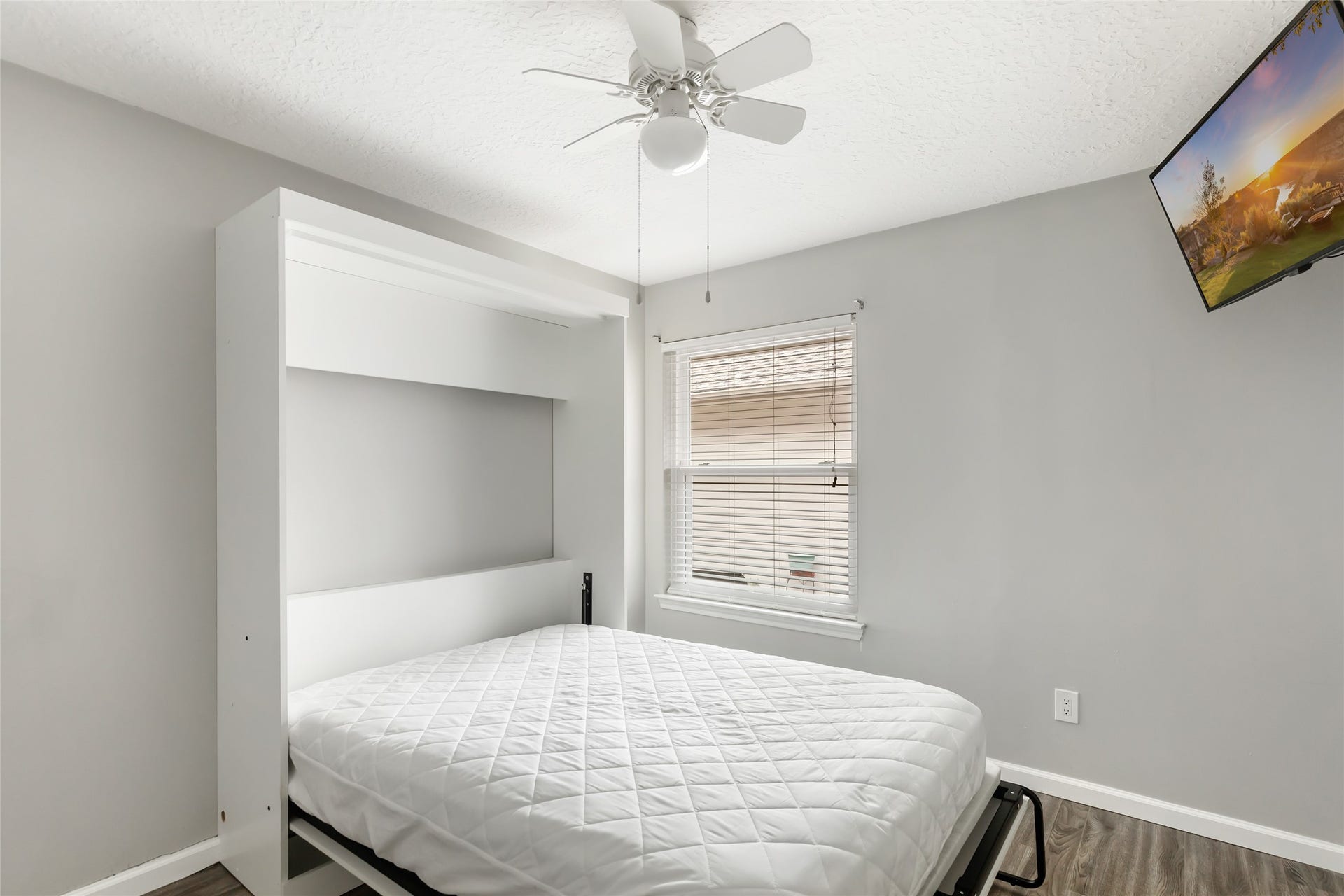 4210 Valley Glade Drive, Kingwood, TX 77345 Bedroom 2 with open Murphy Bed