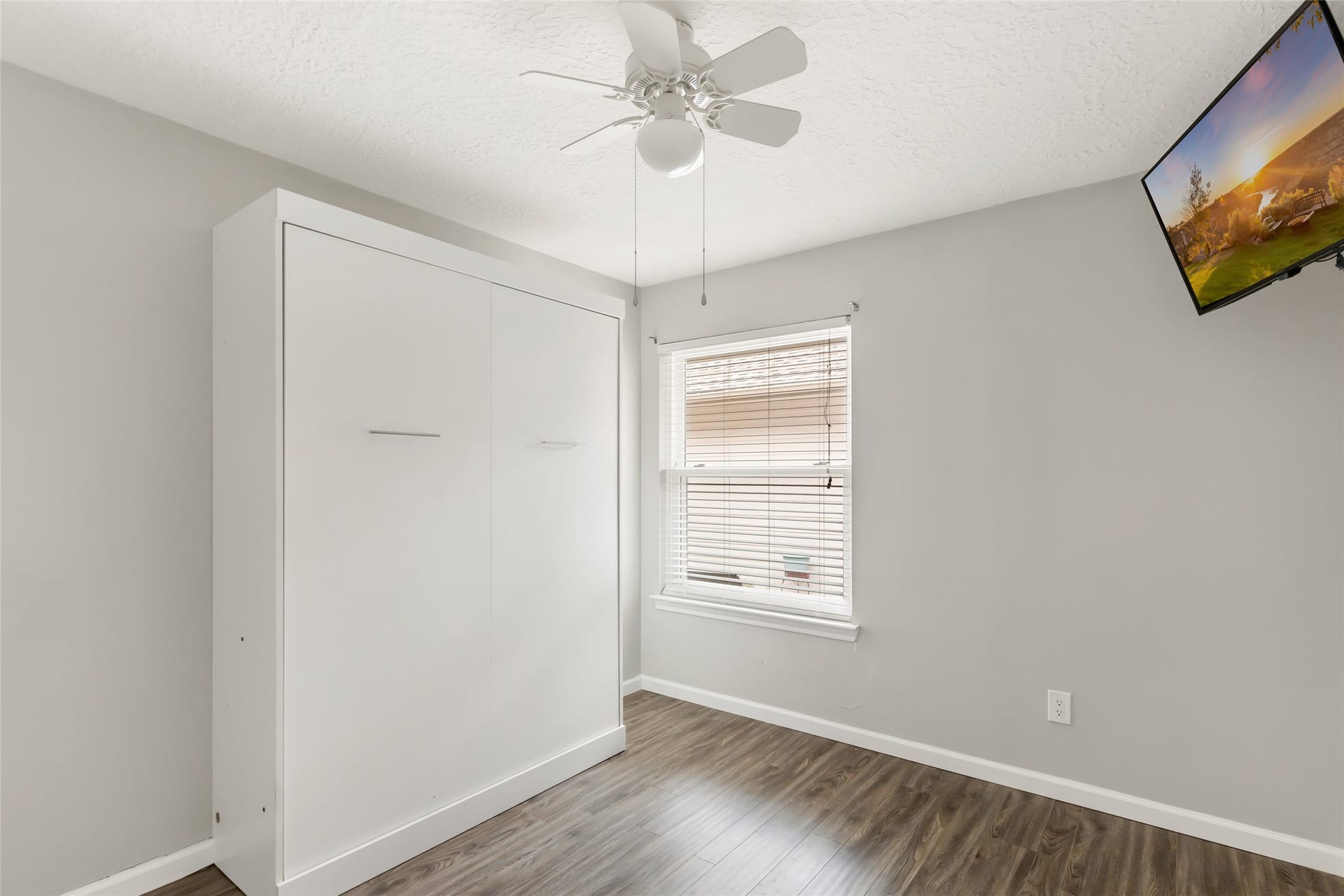 4210 Valley Glade Drive, Kingwood, TX 77345 Bedroom 2 with Murphy Bed