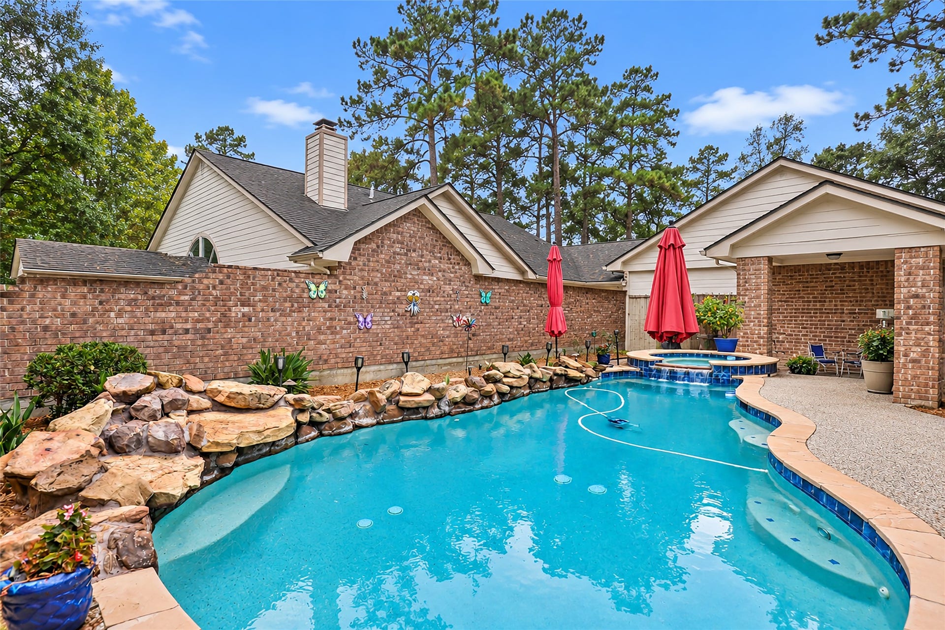 4210 Valley Glade Drive, Kingwood, TX 77345 Relax and enjoy this gorgeous pool, spa, and patio area