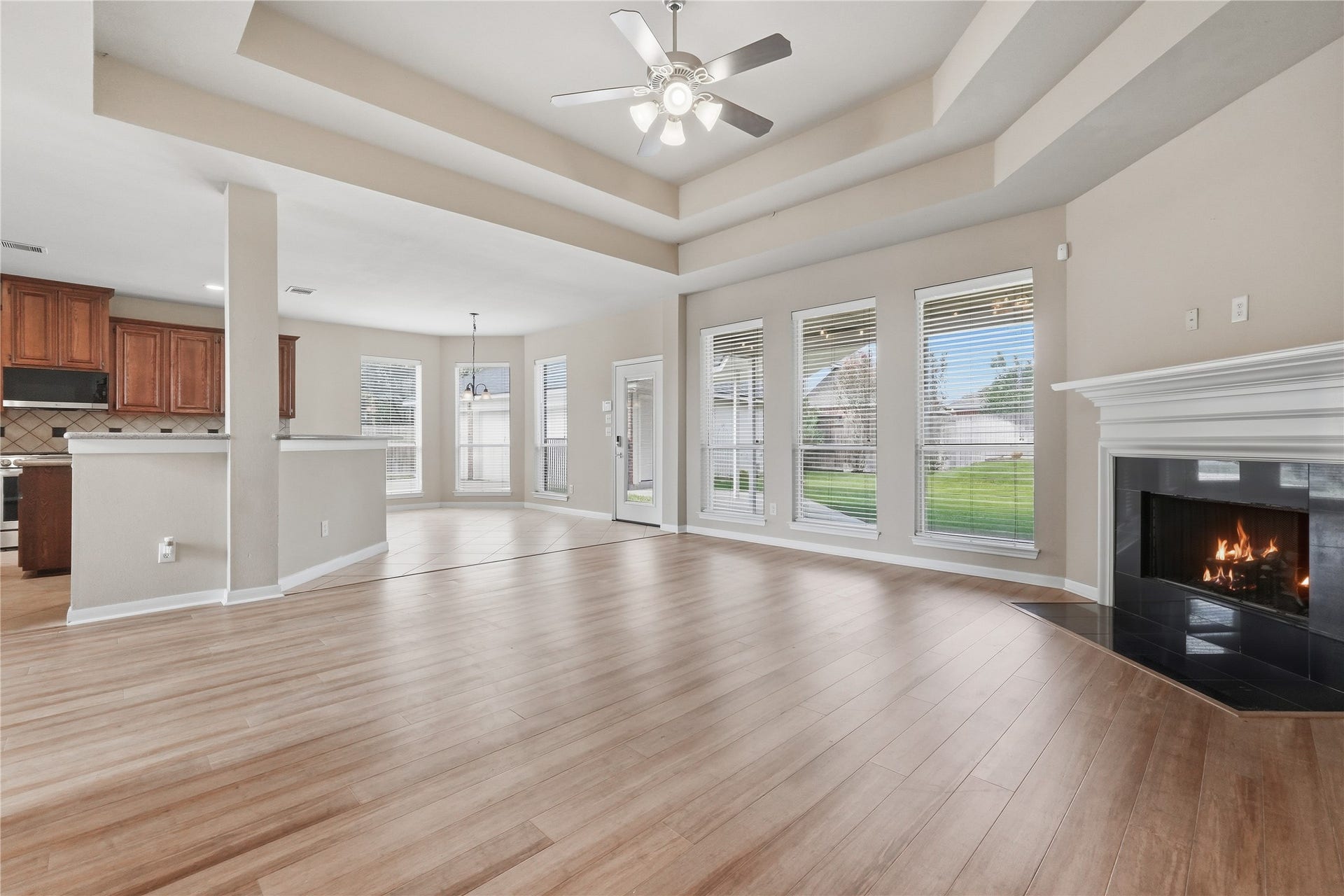 907 Colorado Springs Court, Spring, TX 77373 Notice the wall of windows across the back of the home, the trey ceiling and the fireplace.
